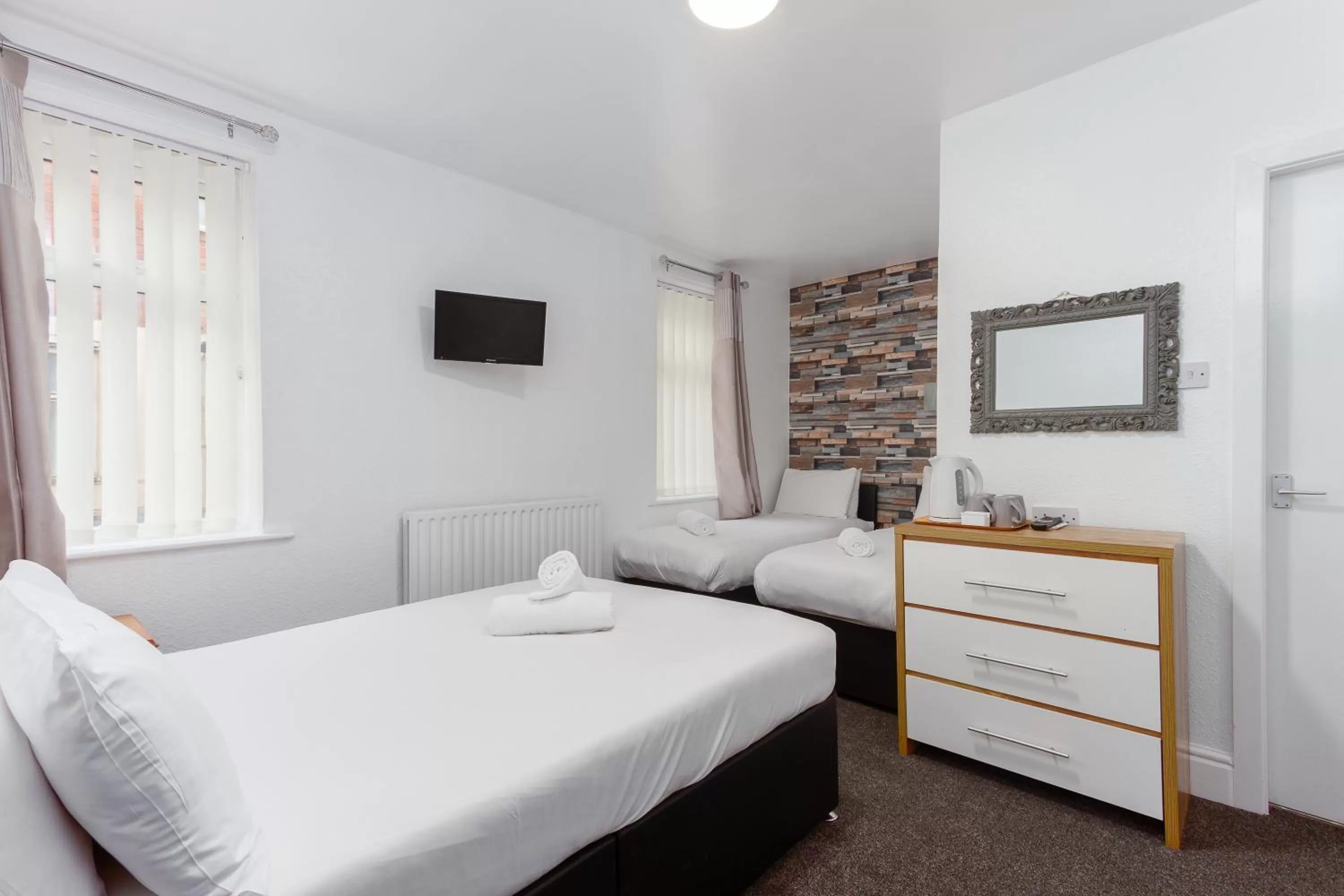Bedroom, Bed in The Sandringham Court Hotel & Apartment Welcoming Large and Small Groups for 15 years