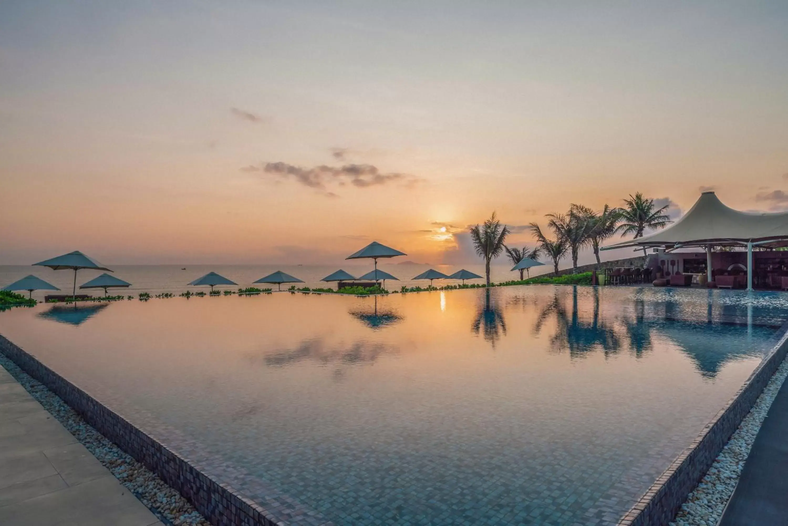 Swimming pool in Fusion Resort Cam Ranh - All Spa Inclusive Swimming pool in Fusion Resort Cam Ranh - All Spa Inclusive