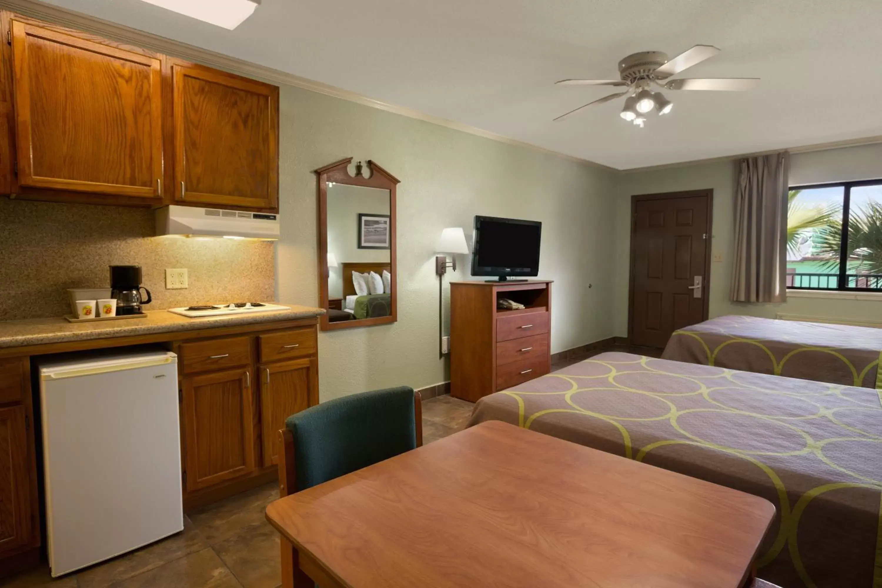 Bedroom, Kitchen/Kitchenette in Super 8 by Wyndham South Padre Island