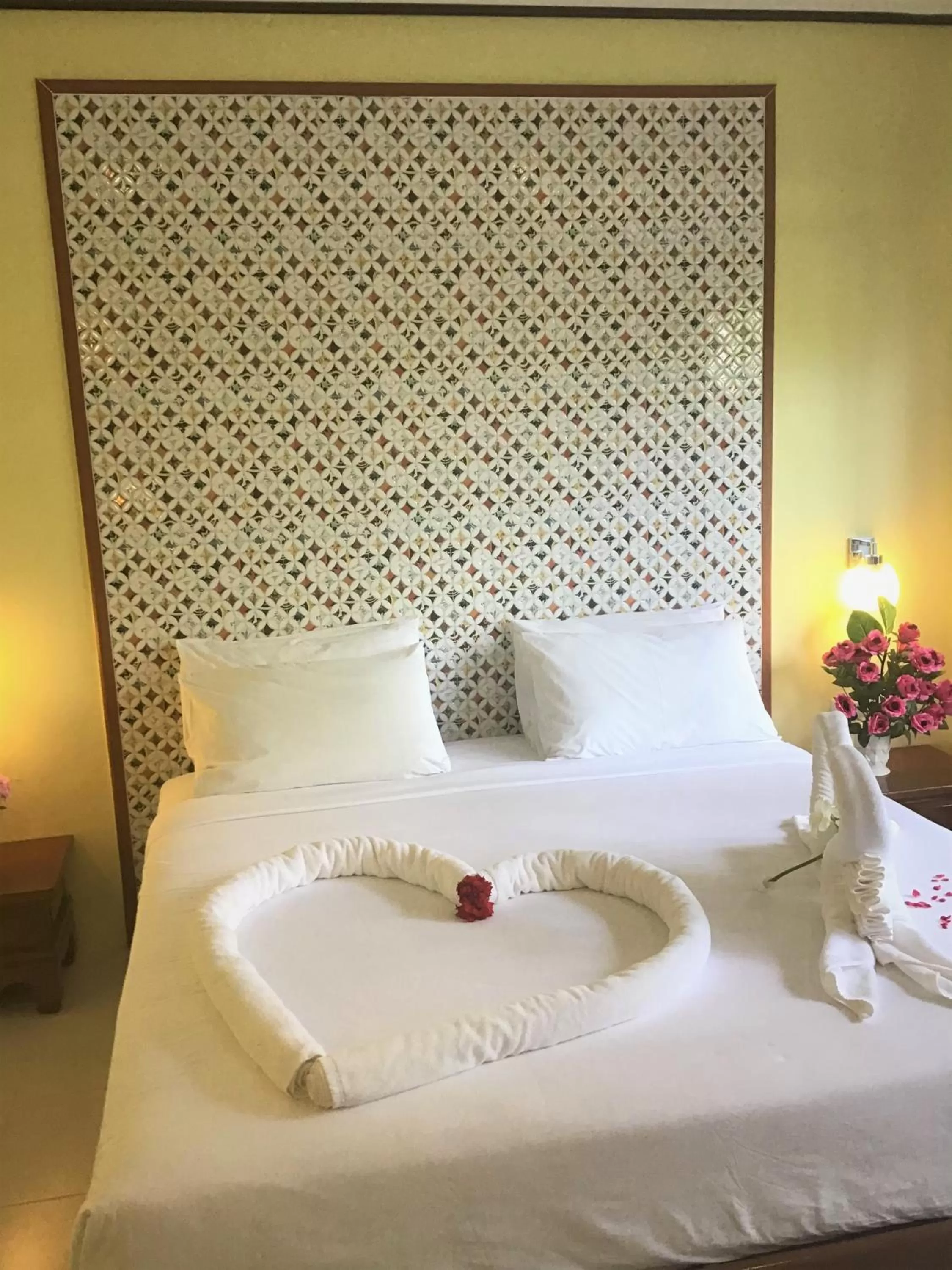 Bed in Pratum Resort