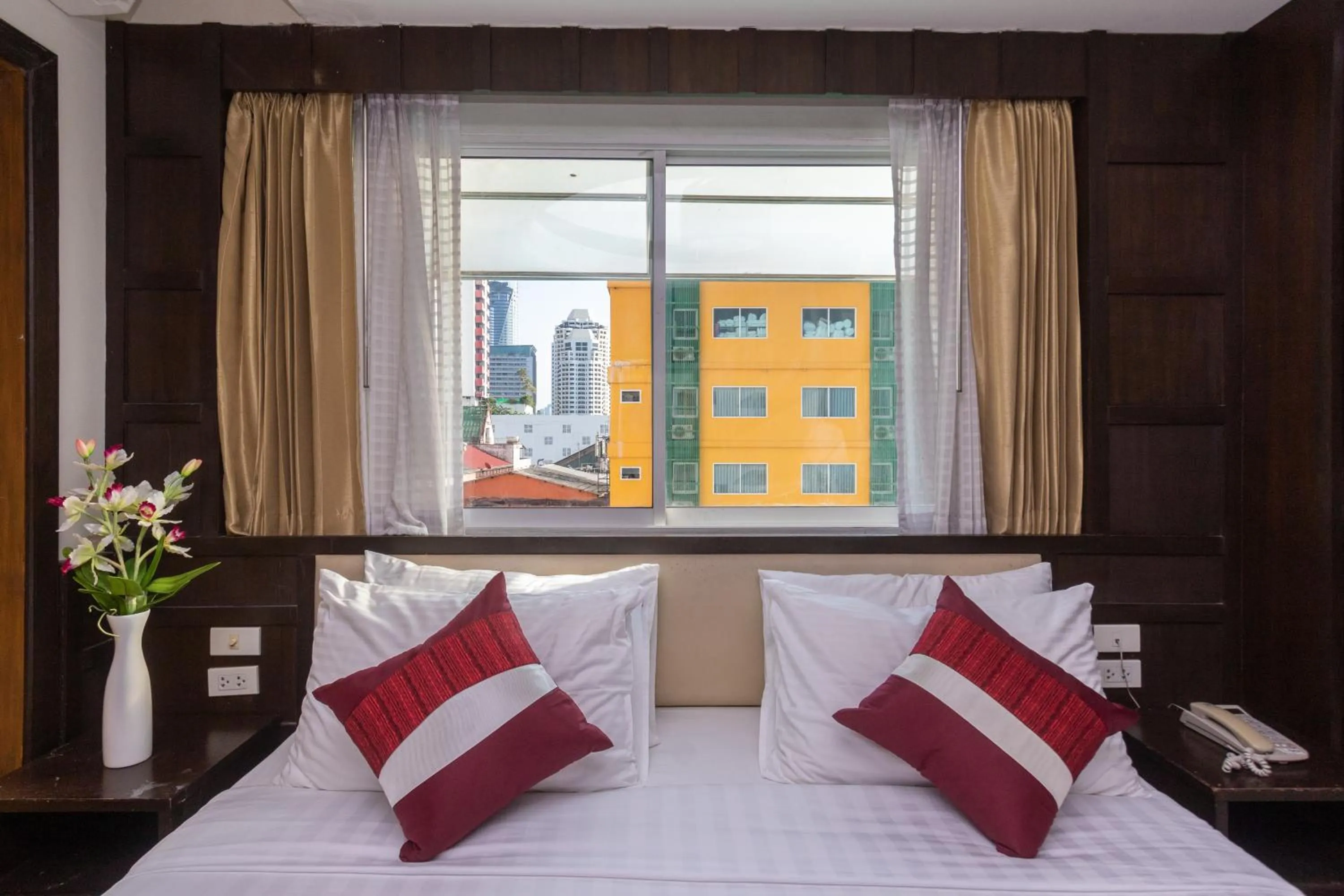 Bed in Gusto Pratunam Hotel