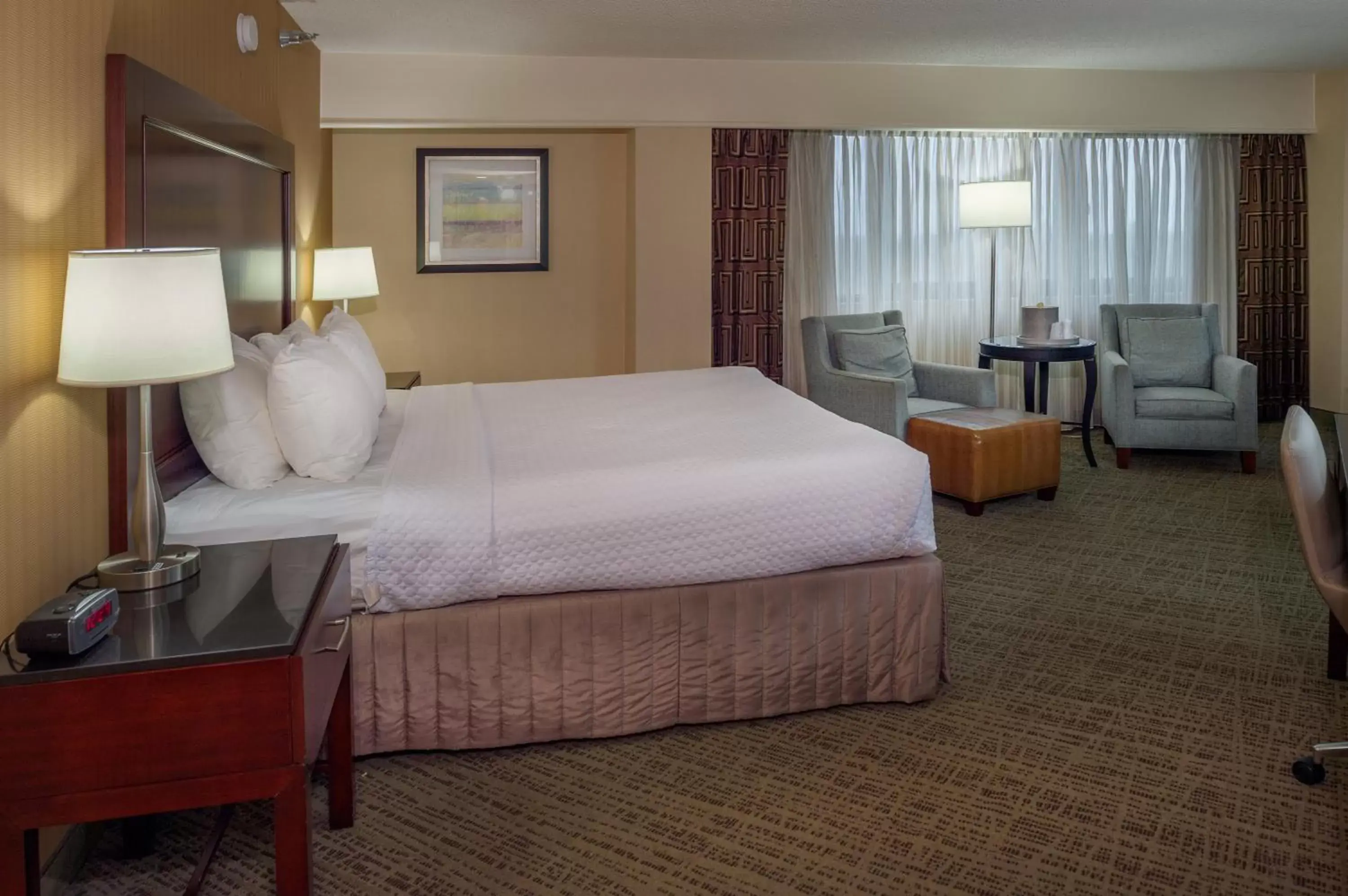 Photo of the whole room, Bed in Crowne Plaza Hotel St. Louis Airport, an IHG Hotel