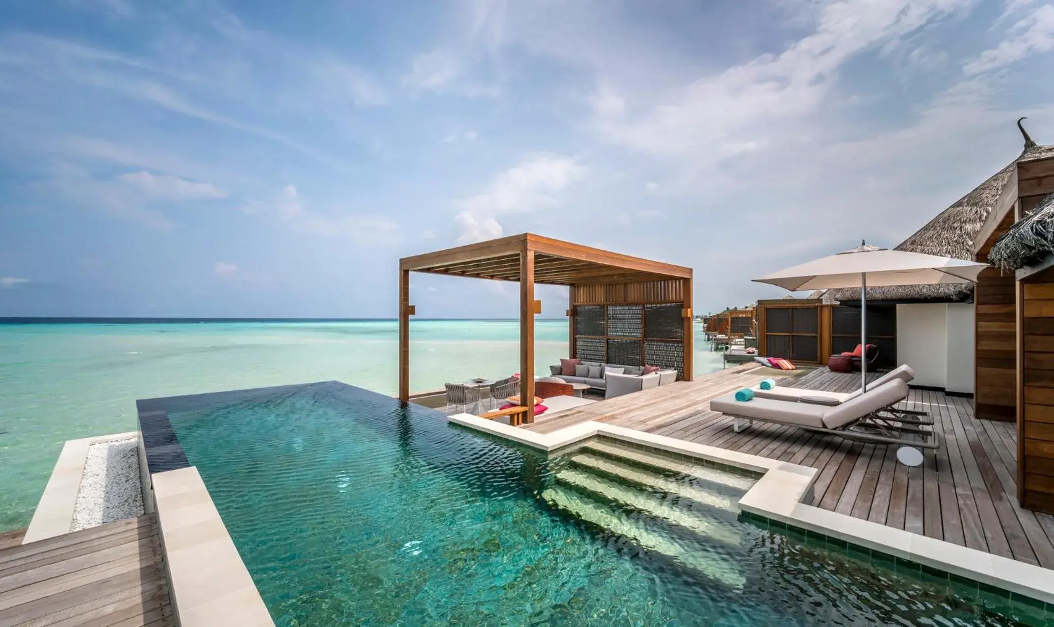 Patio, Swimming Pool in Four Seasons Resort Maldives at Kuda Huraa