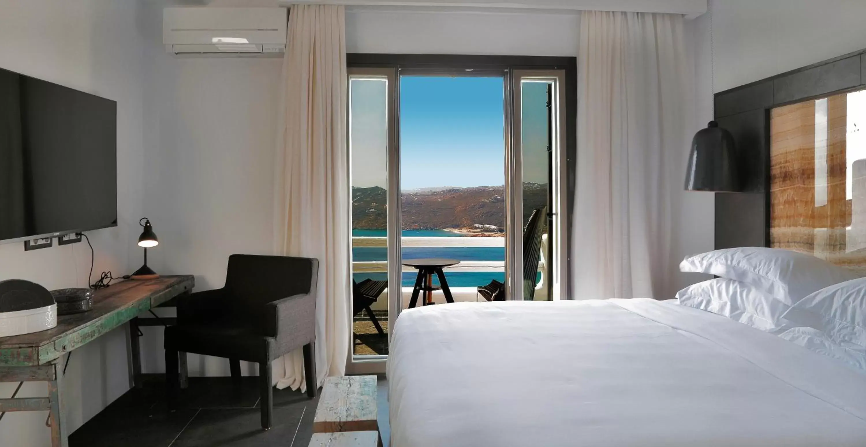 Bed, Mountain View in Myconian Avaton - Design Hotels