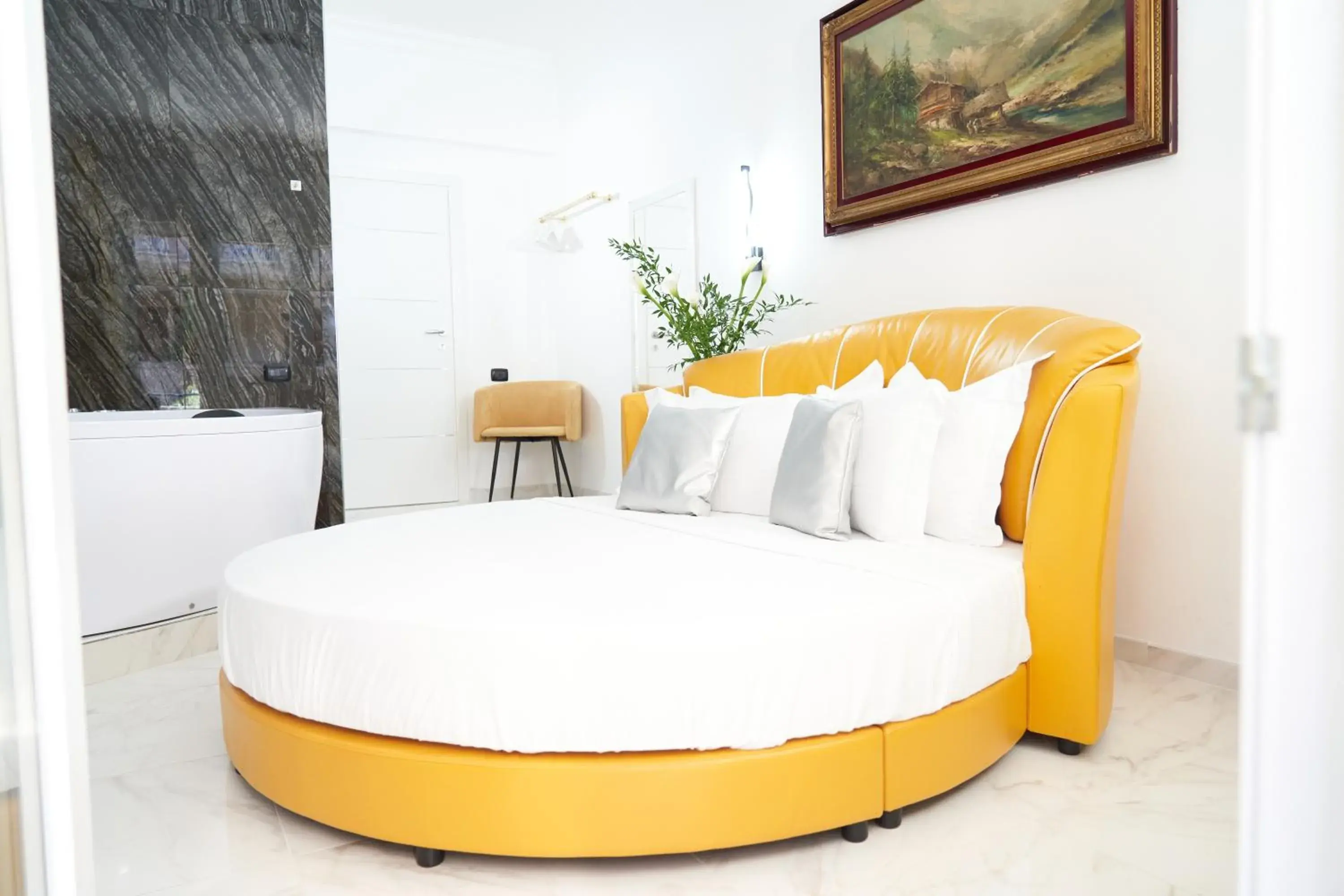 Bed in Gregorio VII Luxury Suites San Damaso
