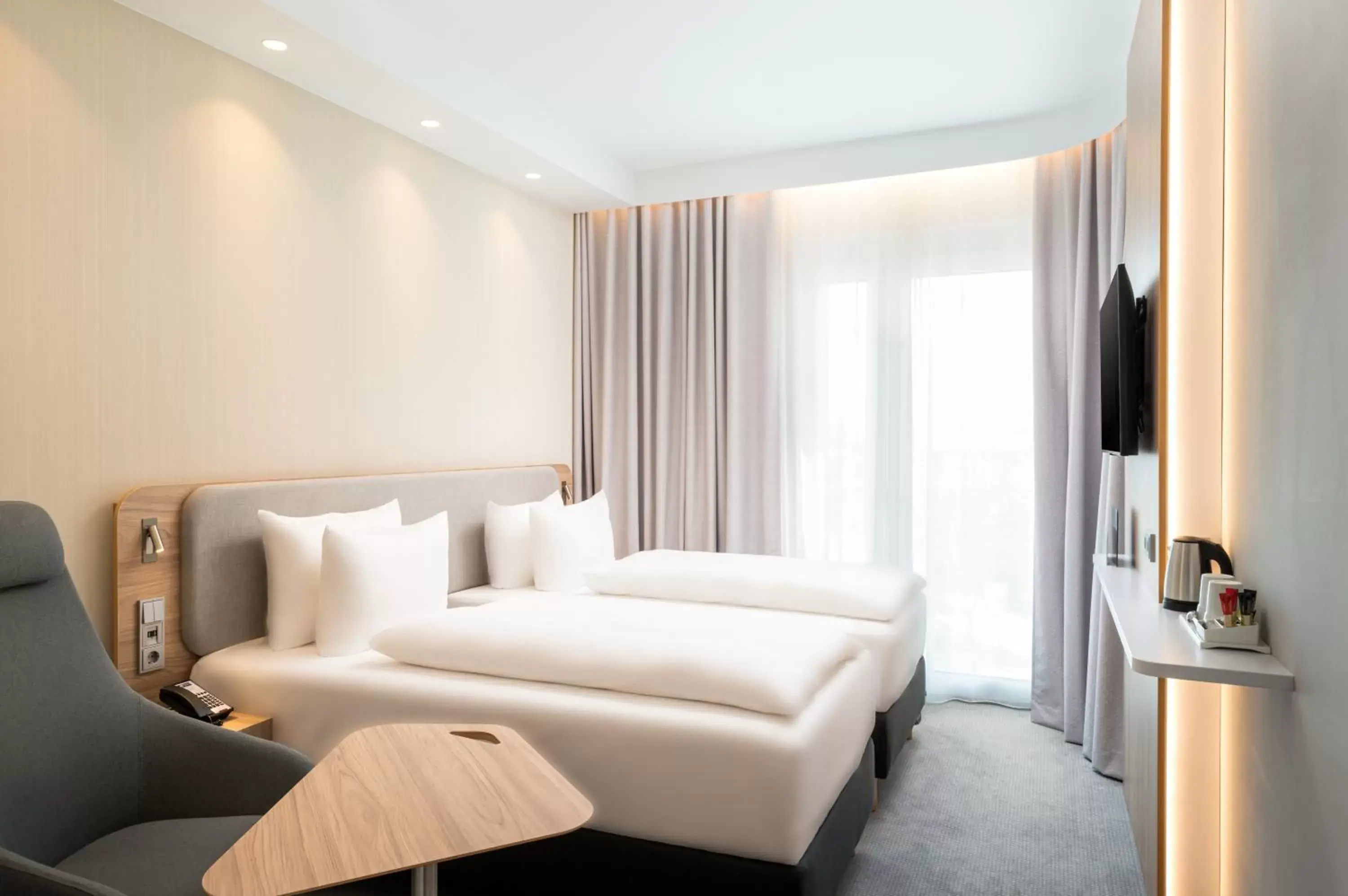 Bedroom, Bed in Holiday Inn Express - Rosenheim, an IHG Hotel
