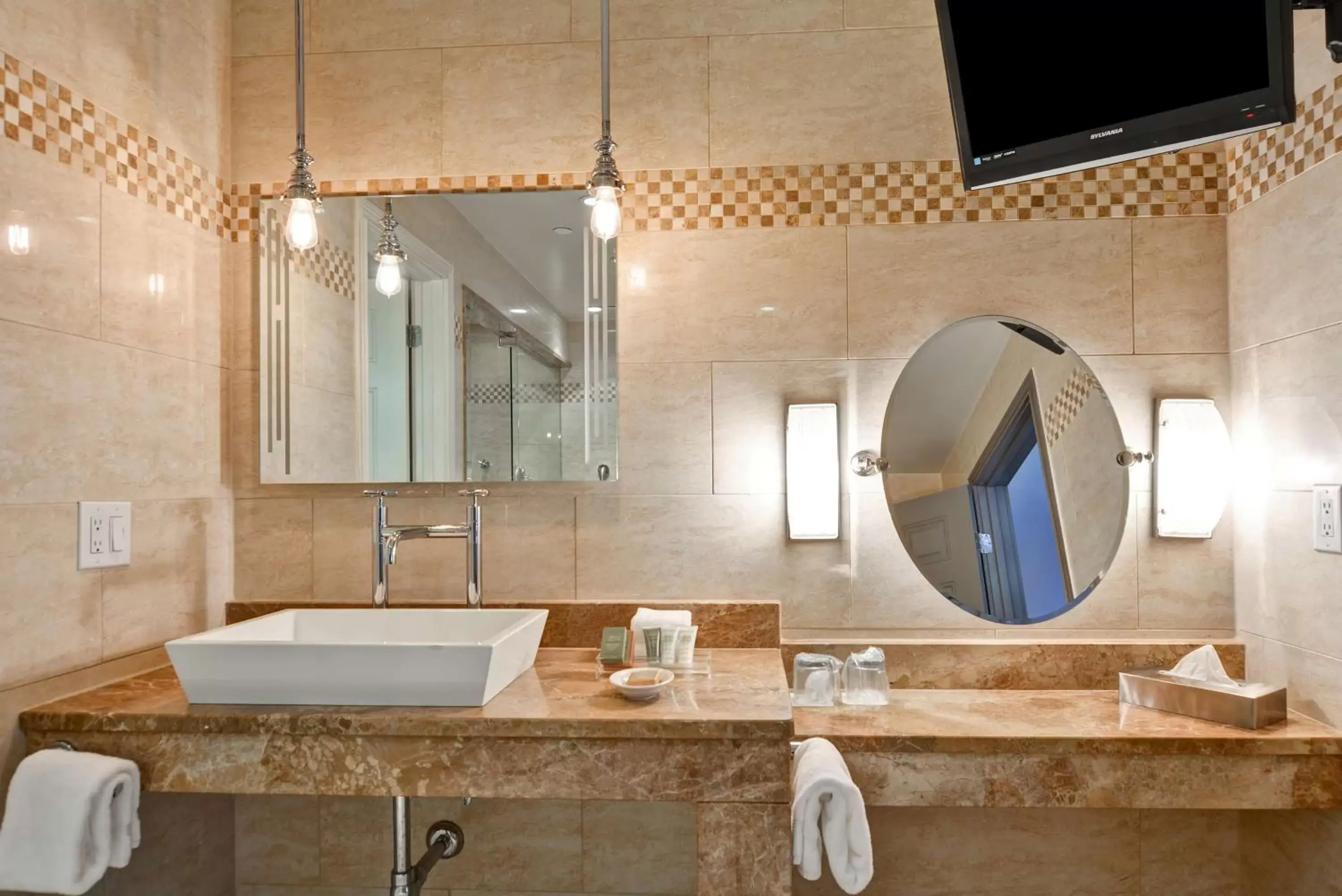 Bathroom in The Cincinnatian Curio Collection by Hilton