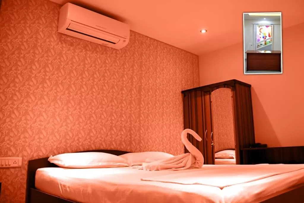 Bed in Star MSR Residency