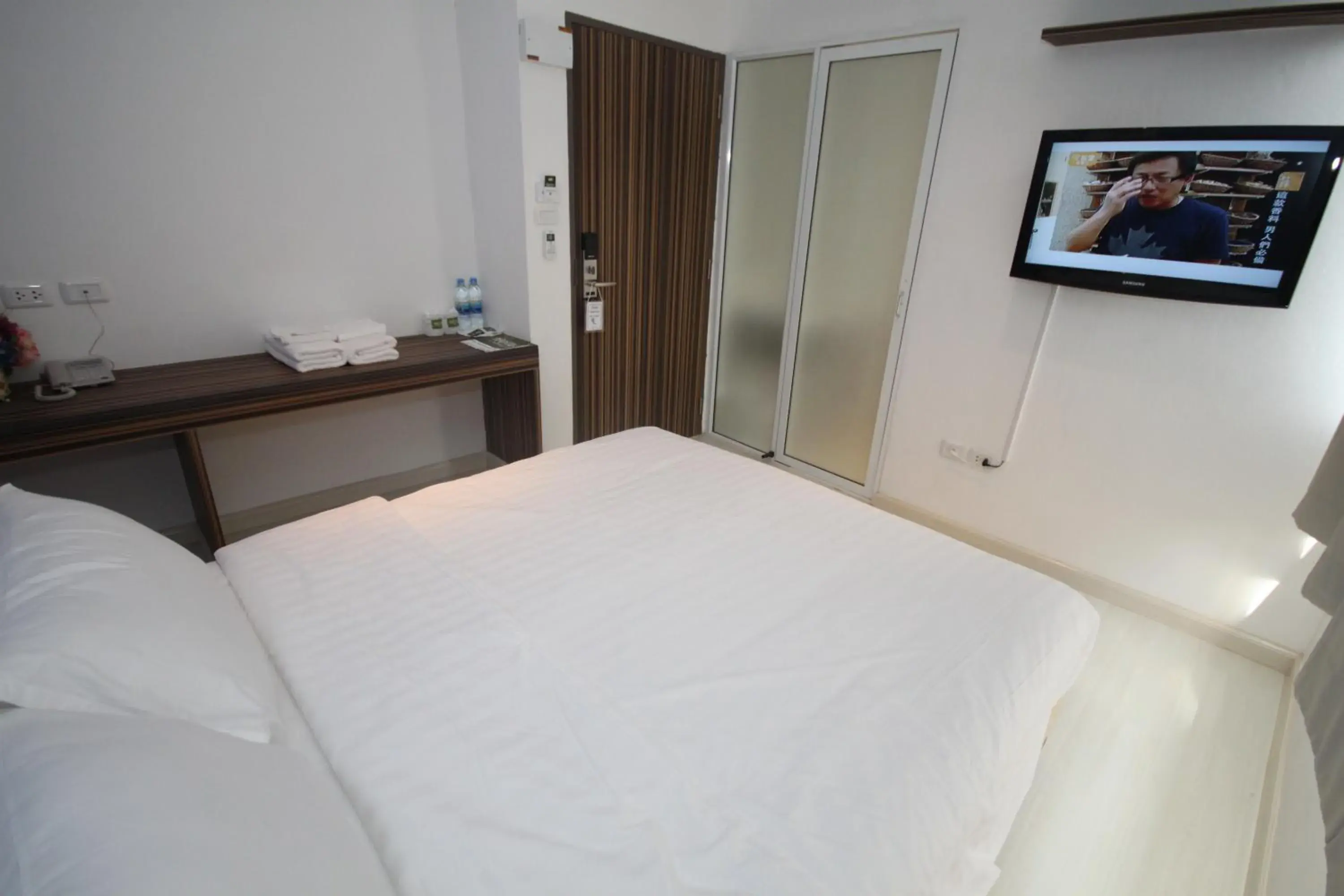 Photo of the whole room, Bed in Nantra Ekamai Hotel