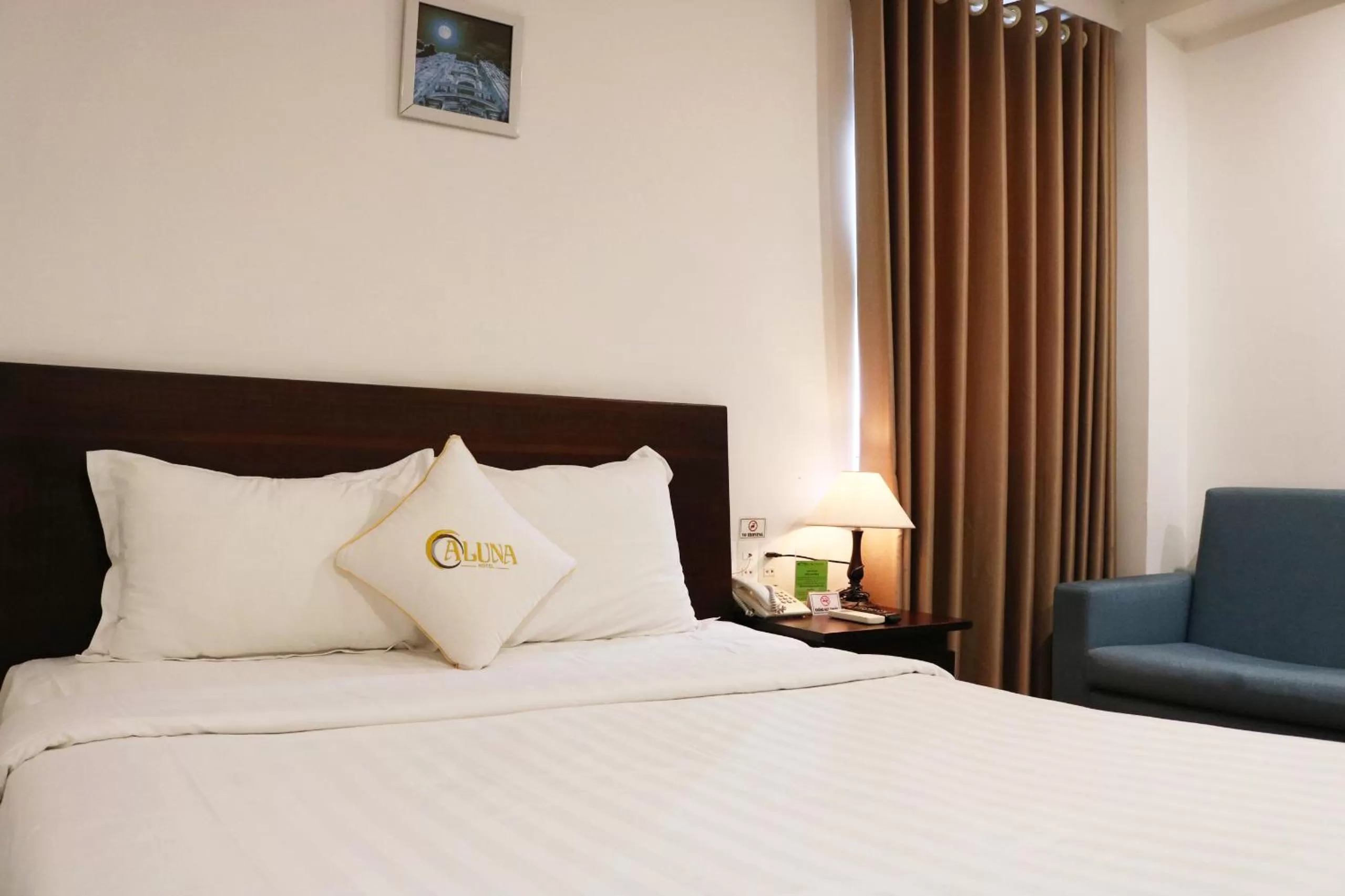 Bed in ALUNA Ben Thanh Hotel