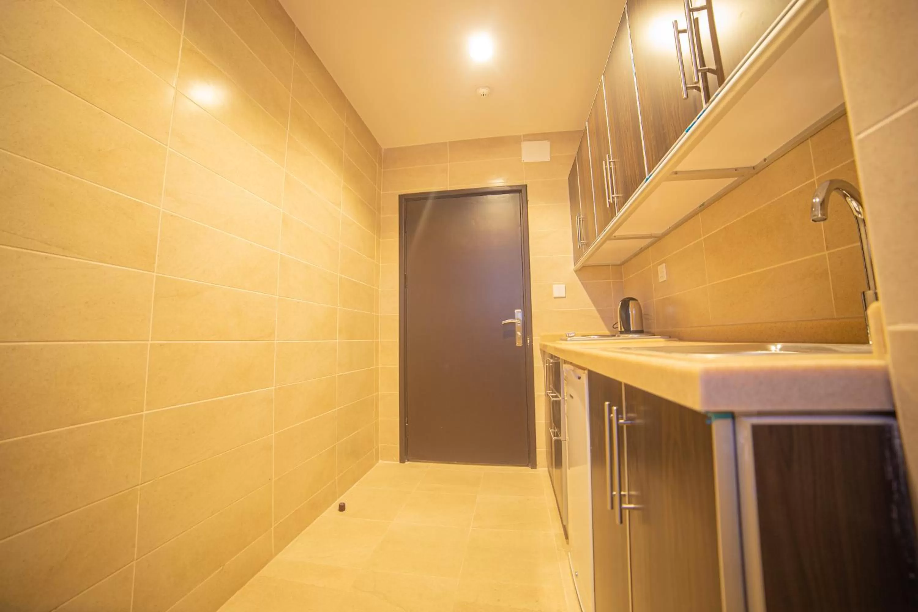 Kitchen or kitchenette in Mabet Al Tahlia Serviced Apartments