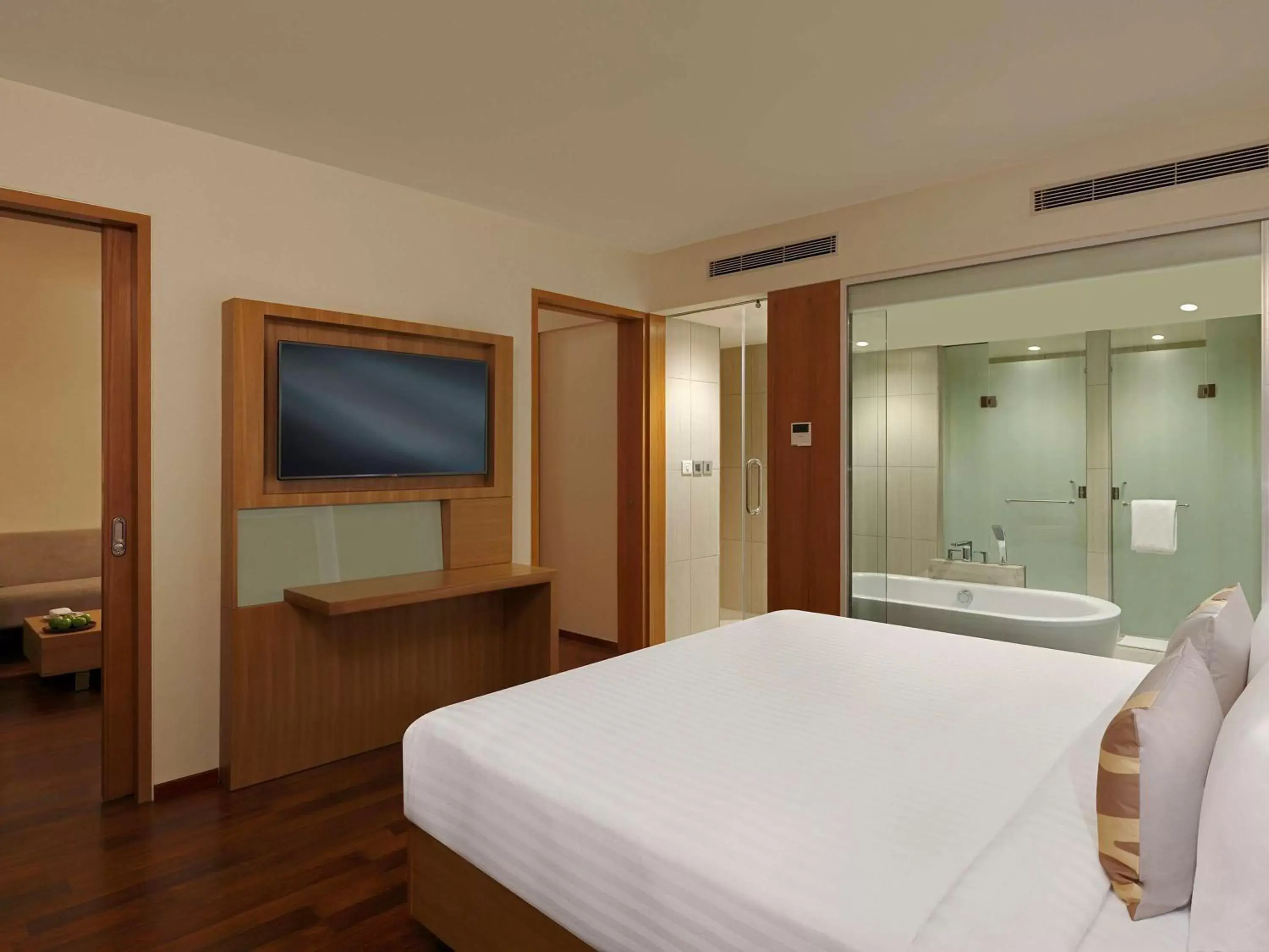 Photo of the whole room, Bed in Novotel Chennai OMR