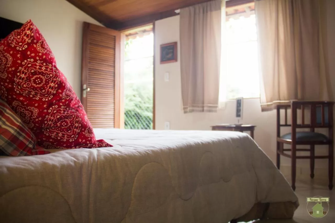 Bed in Pousada Nossa Terra