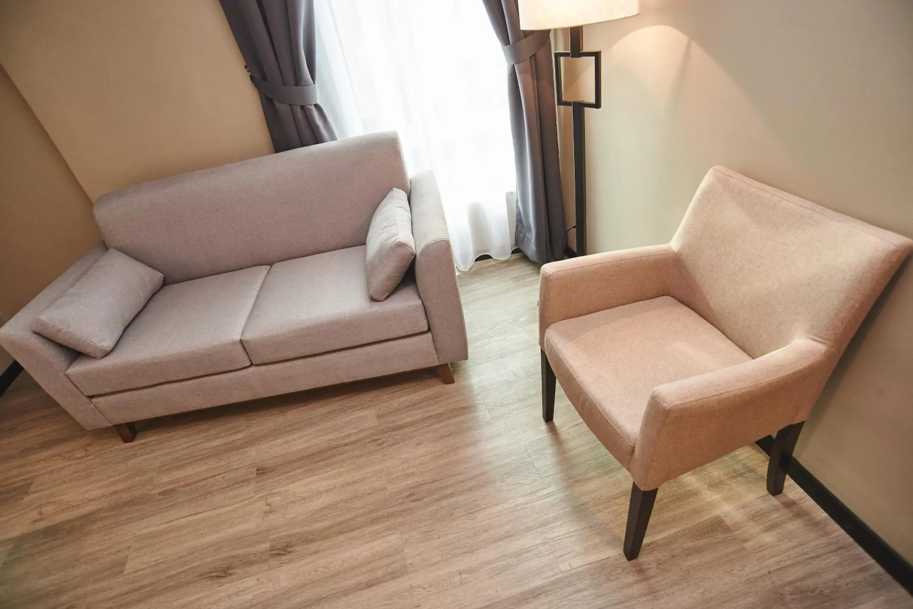 Bedroom, Seating Area in Corsica Hotel