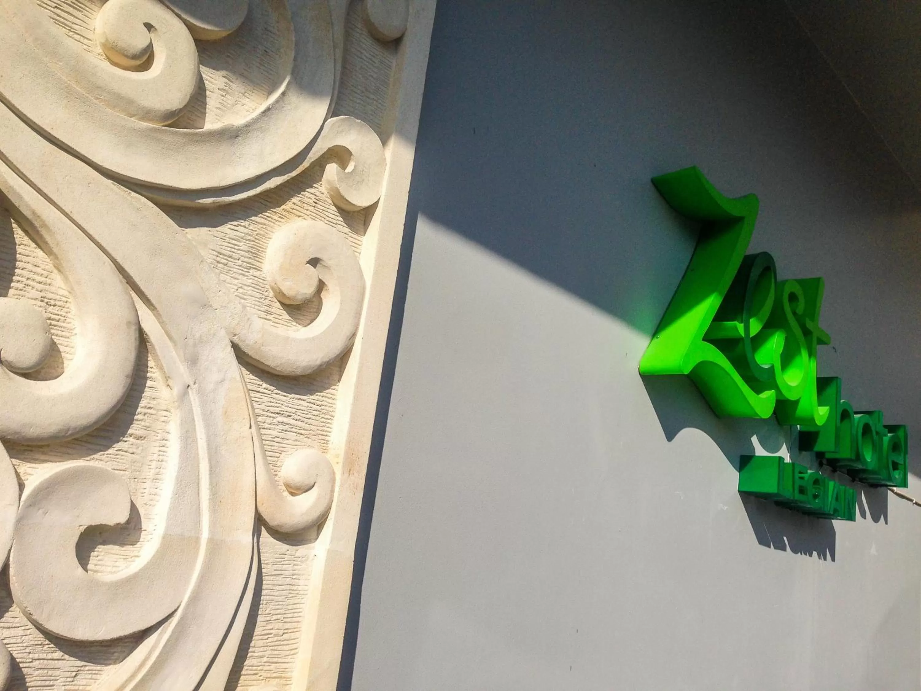 Property logo or sign in Zest Legian by Swiss-Belhotel International