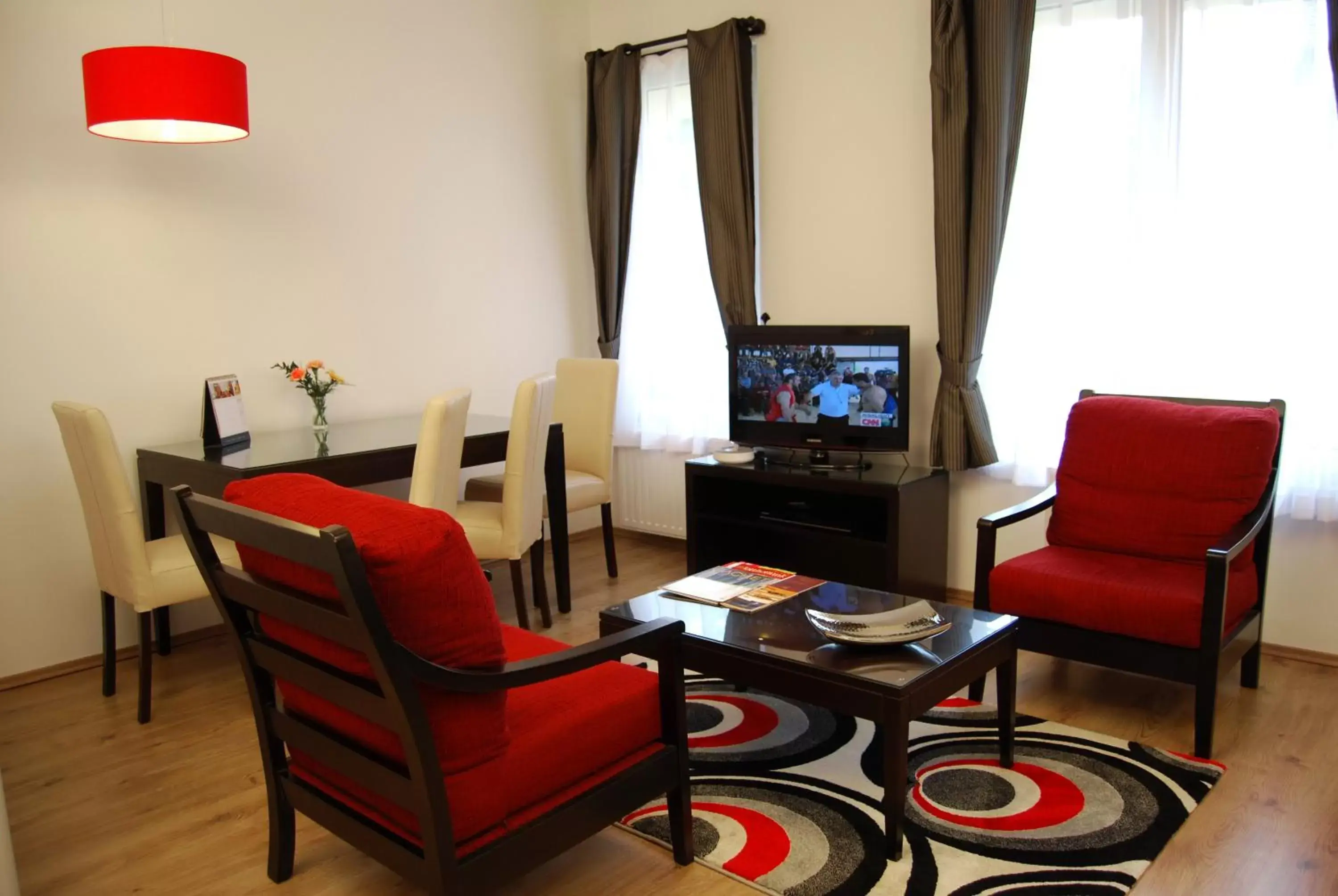 TV and multimedia, TV/Entertainment Center in Escala Hotel & Suites