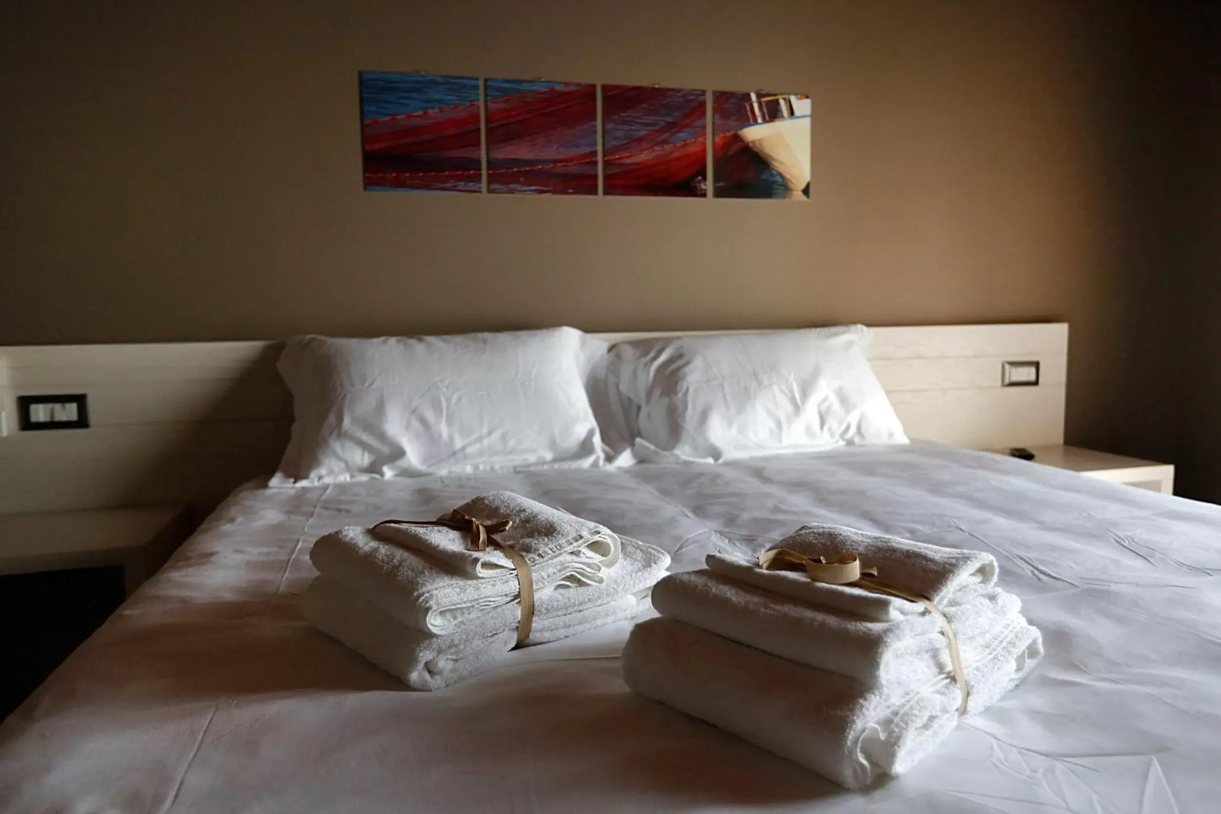 Bed in Il Casato Deluxe Rooms
