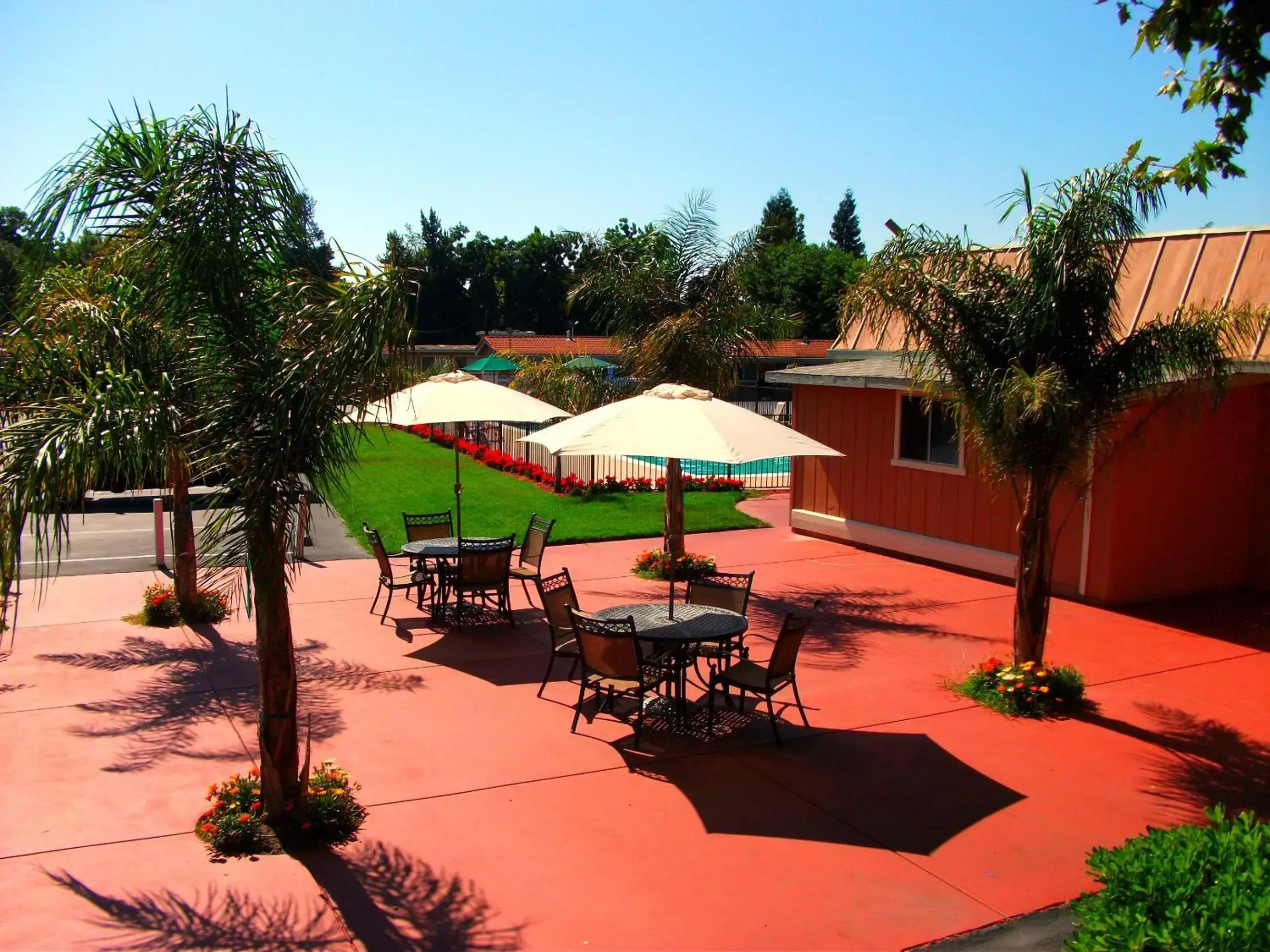 Patio, Pool View in Tri-Valley Inn & Suites