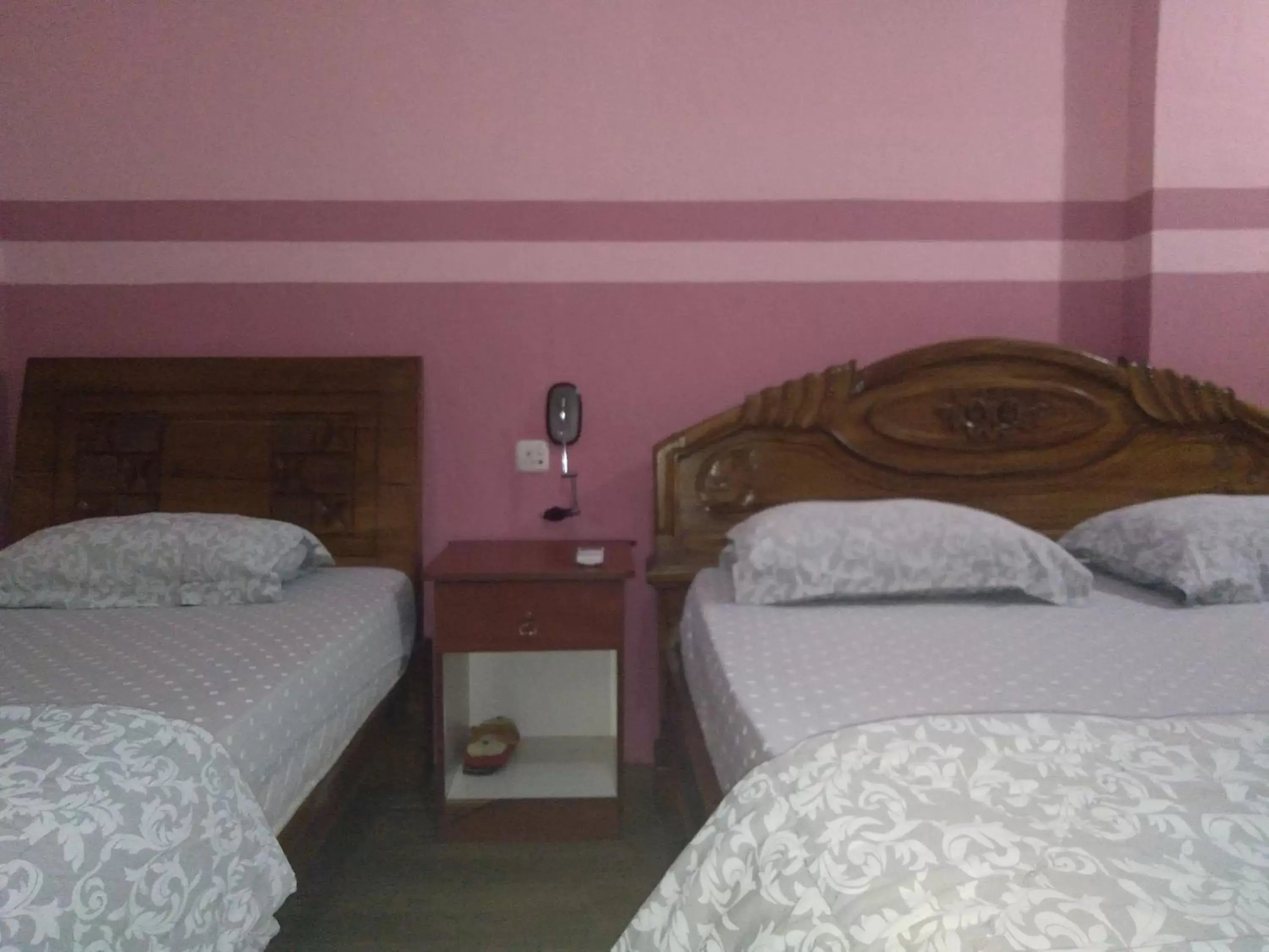 Bed in OYO 90346 Safa Hotel Ranau