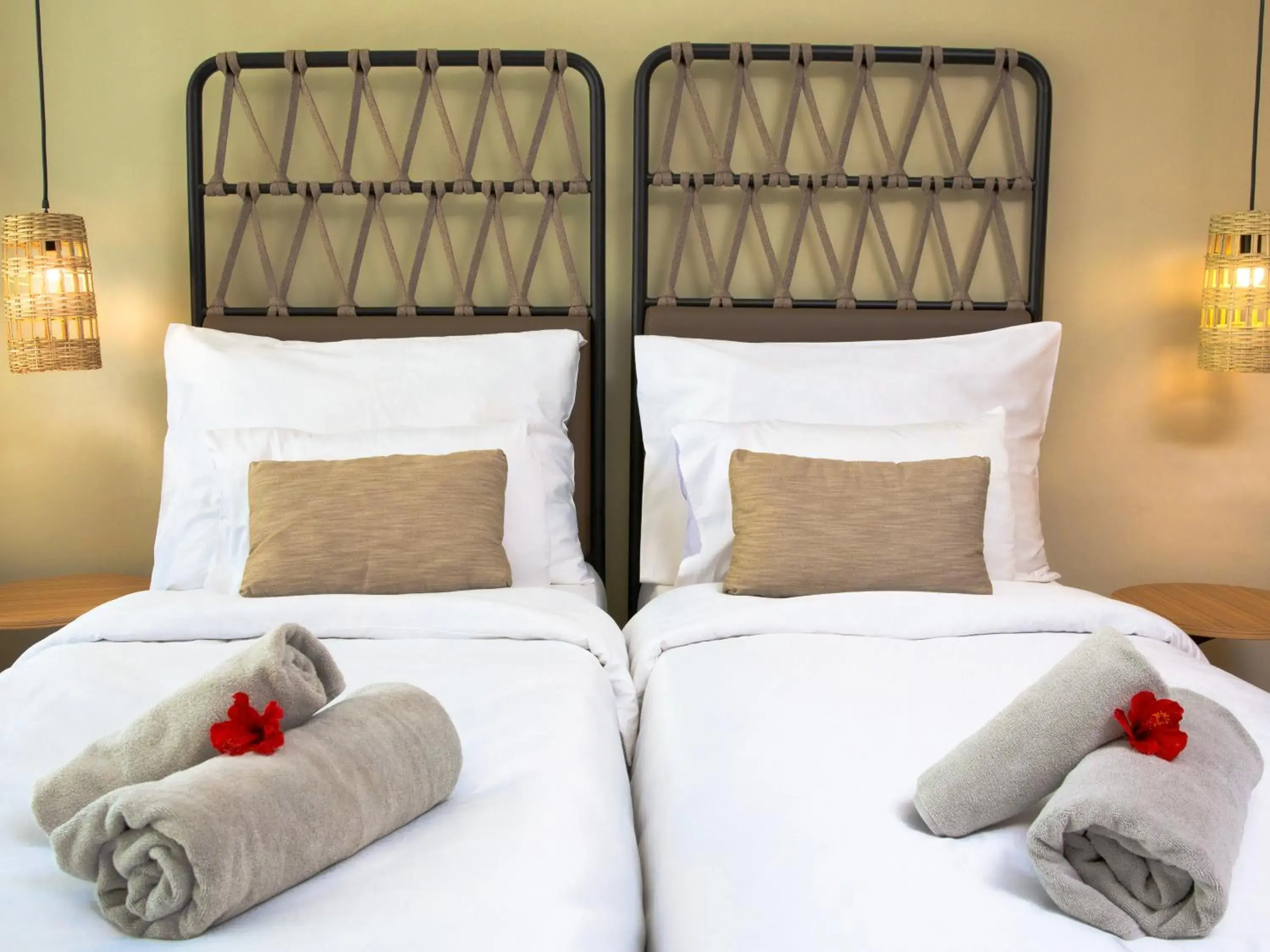 Bed in KOMBO BEACH HOTEL