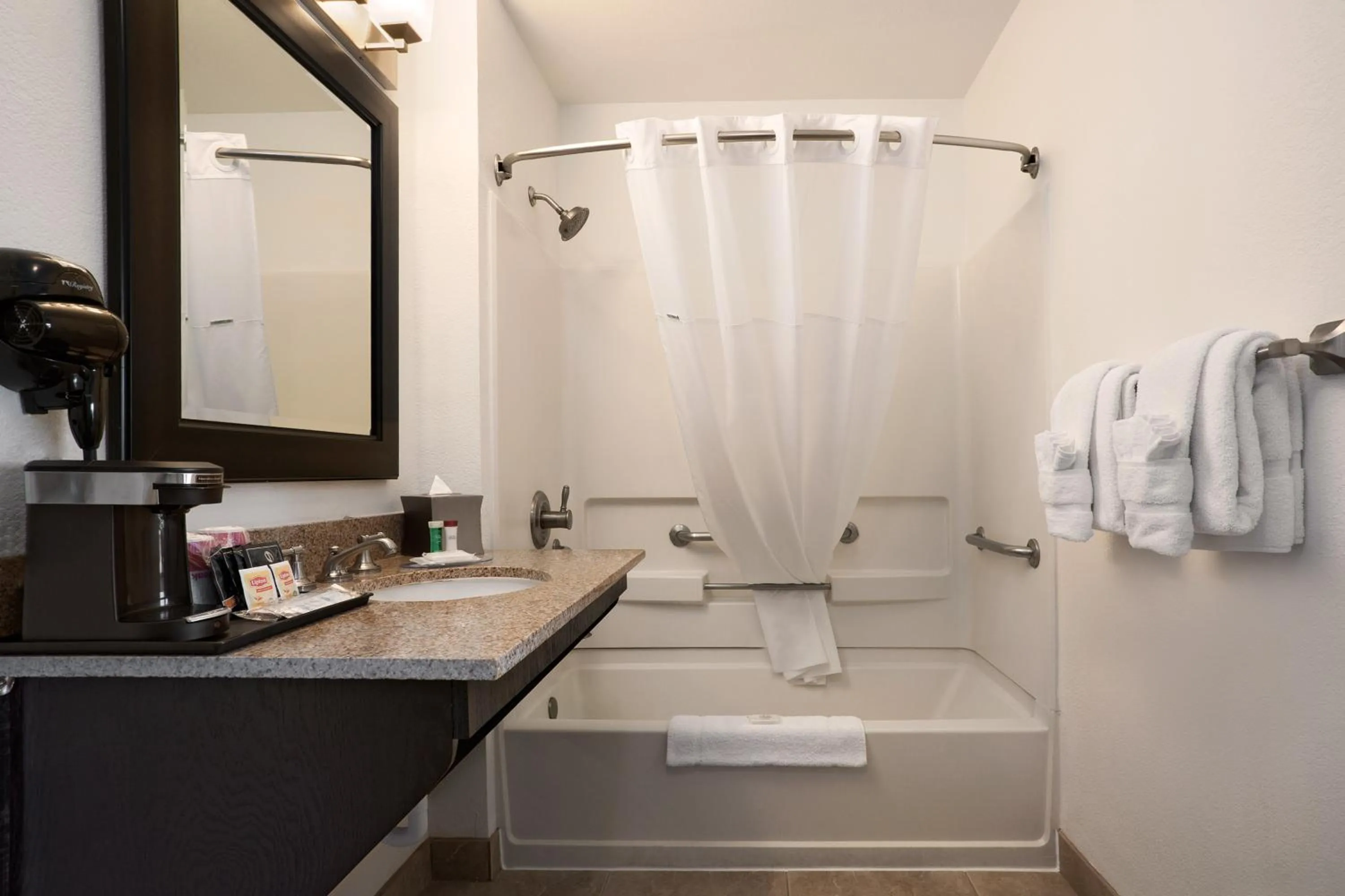 Bathroom in Infinity Inn & Suites