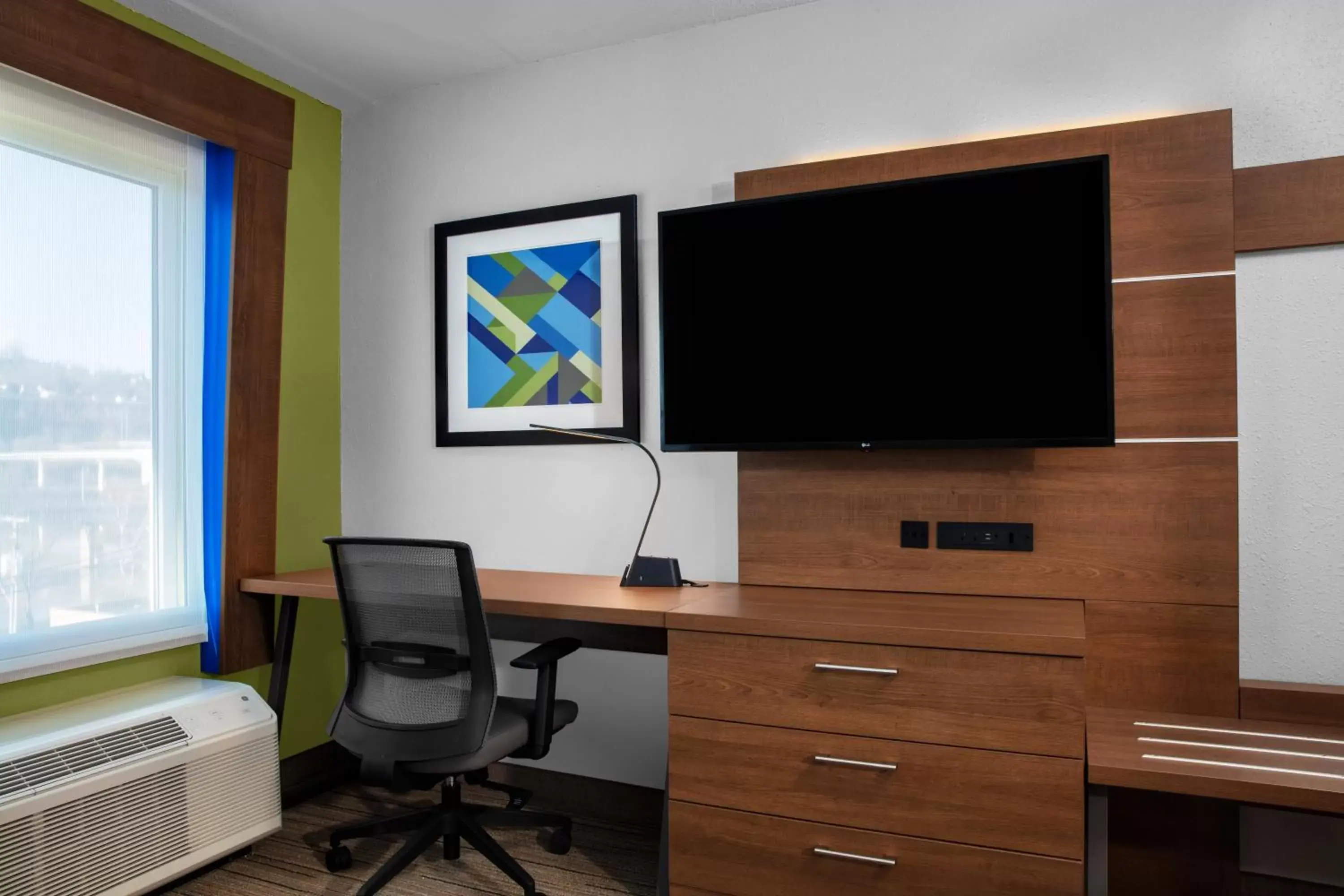 TV and multimedia, TV/Entertainment Center in Holiday Inn Express Charleston-Civic Center, an IHG Hotel