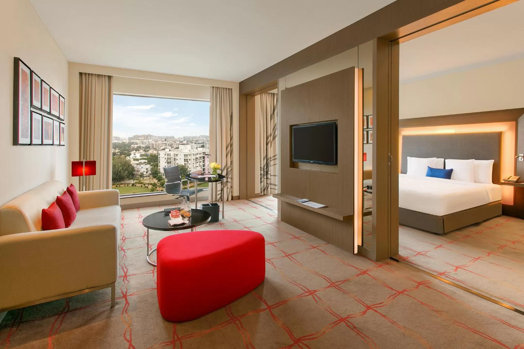Living room, Bed in Novotel Ahmedabad