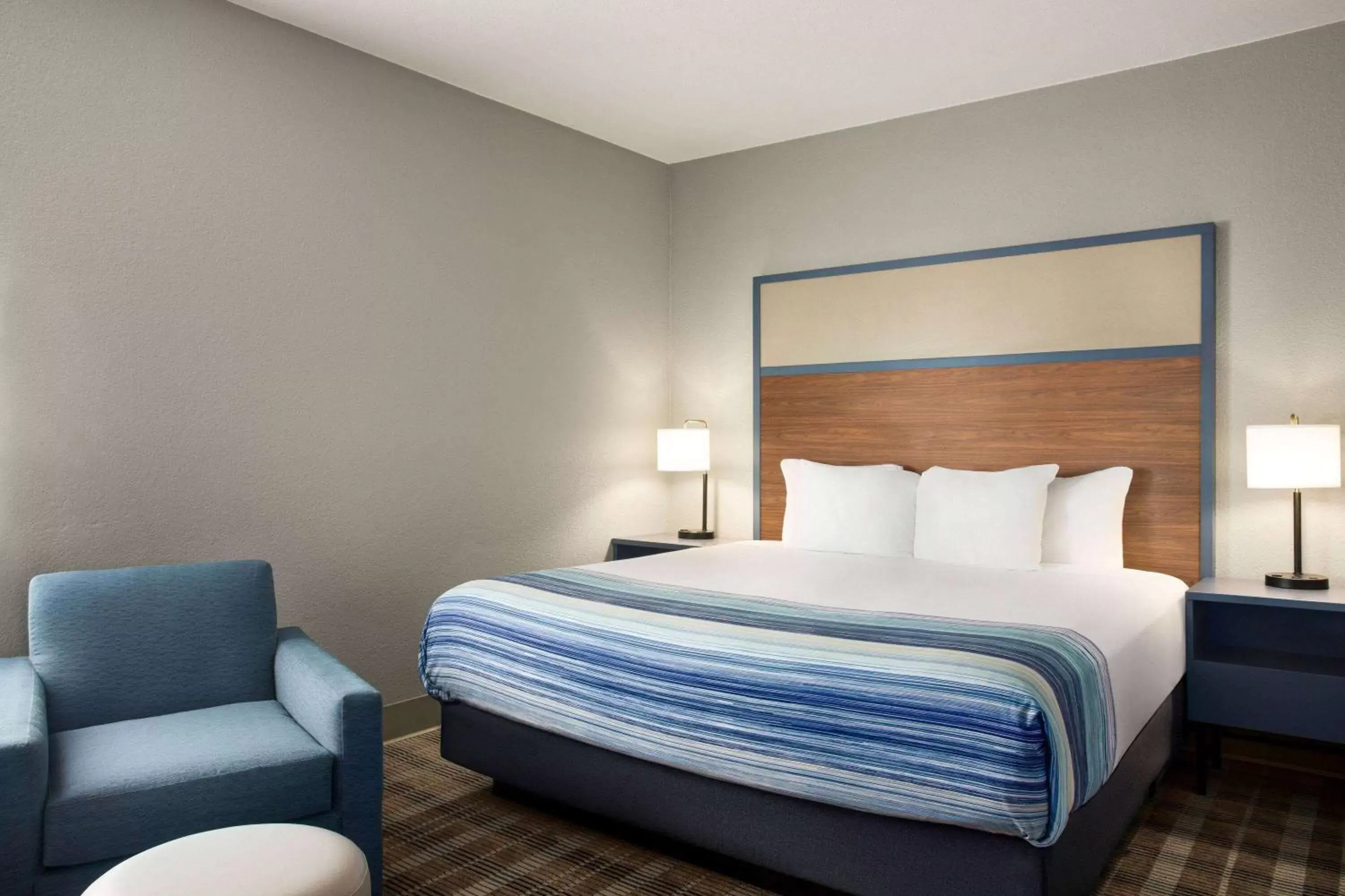 Photo of the whole room, Bed in AmericInn by Wyndham Branson & Conference Center