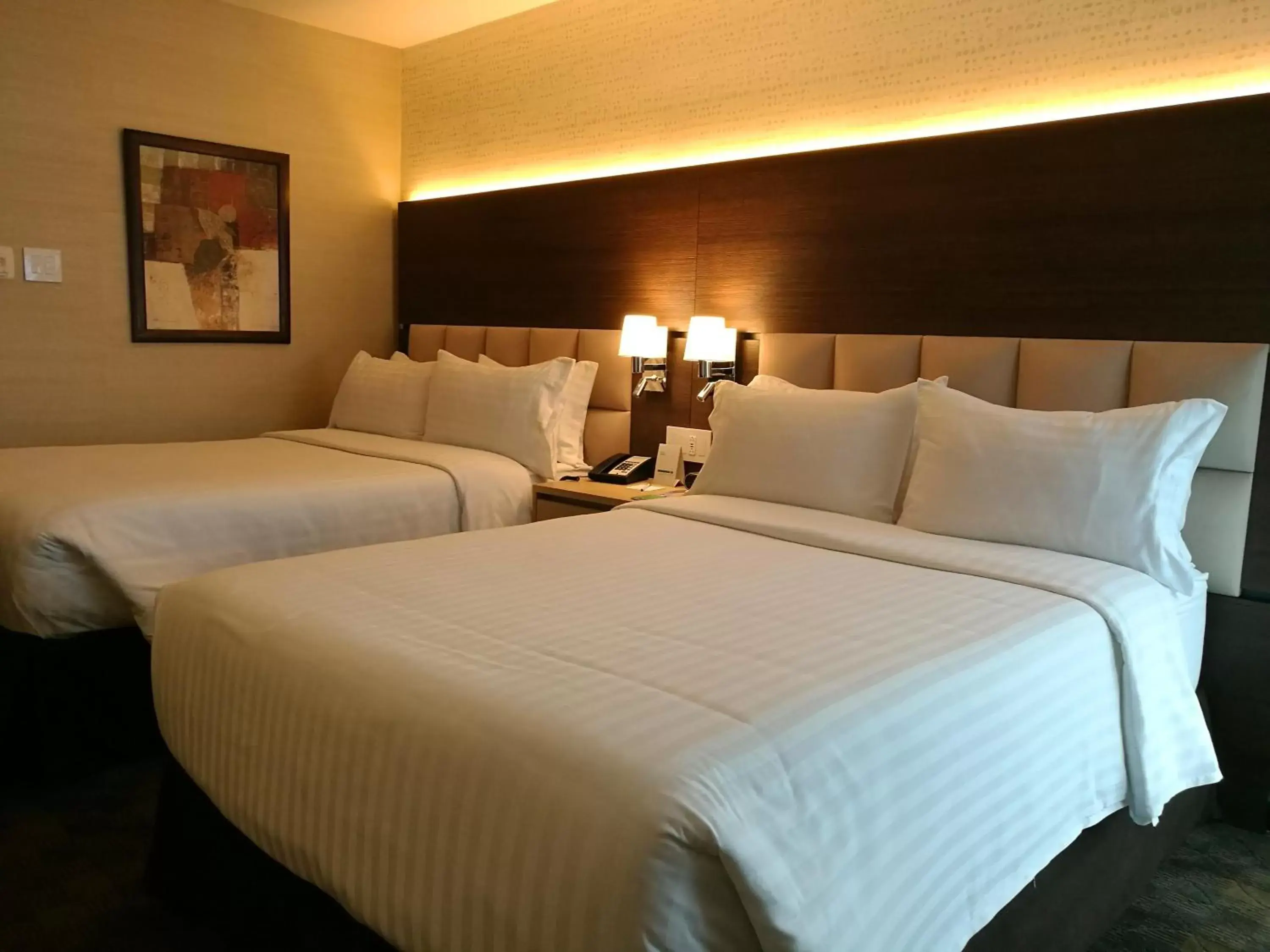 Bed in Holiday Inn Guatemala, an IHG Hotel
