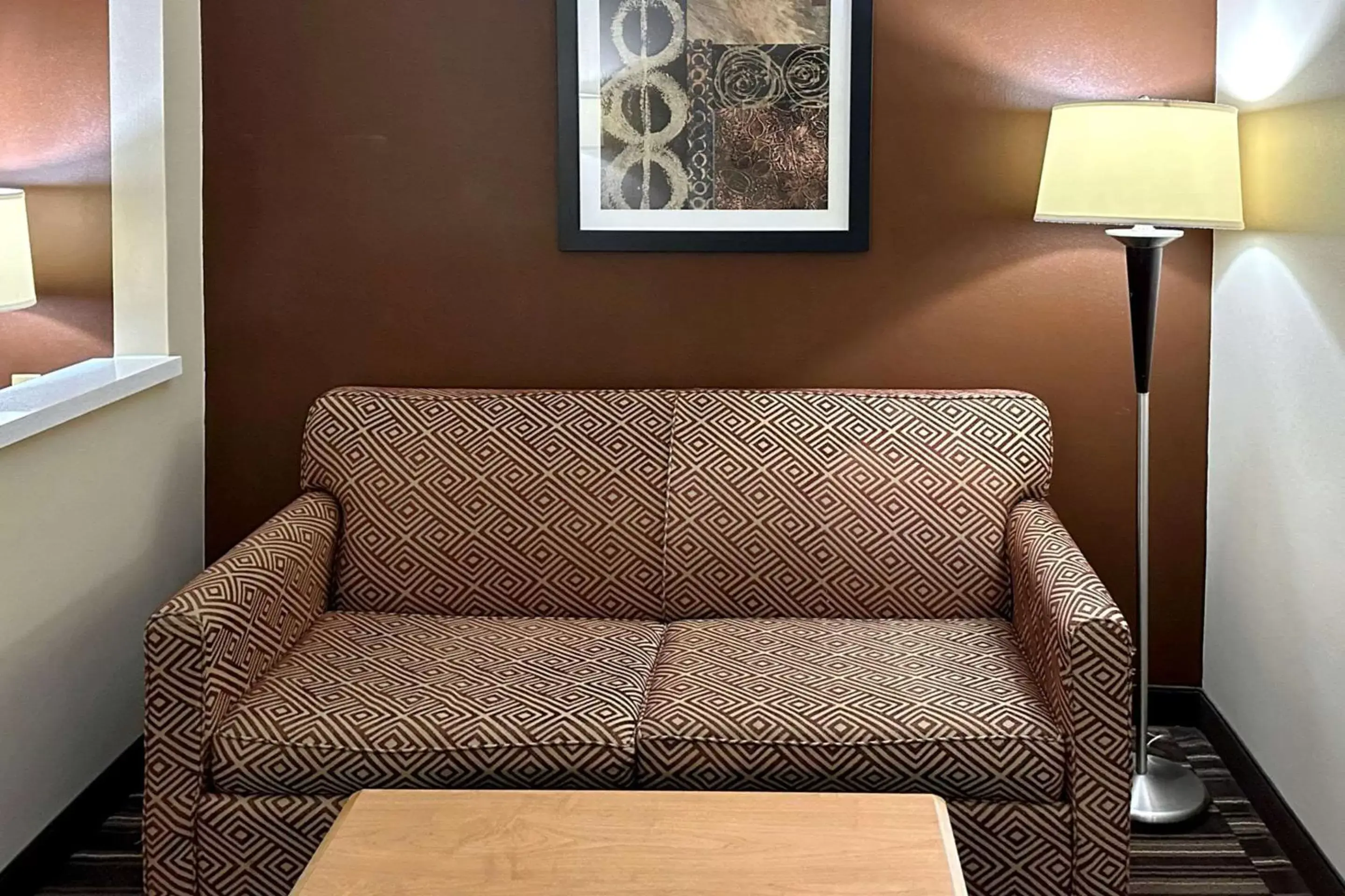 Bedroom, Seating Area in Quality Suites Near West Acres