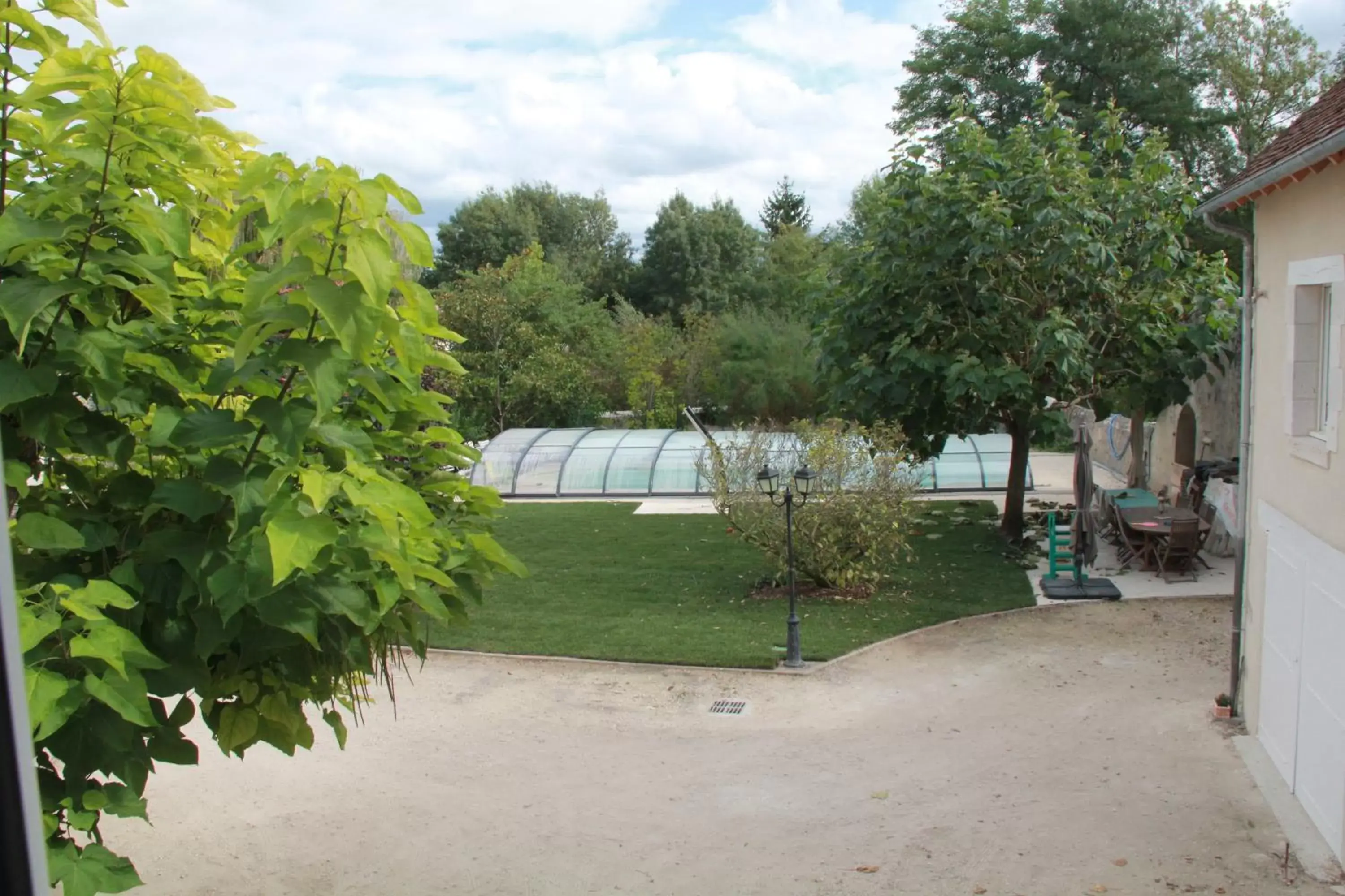 Garden view in Manoir le Bout du Pont
