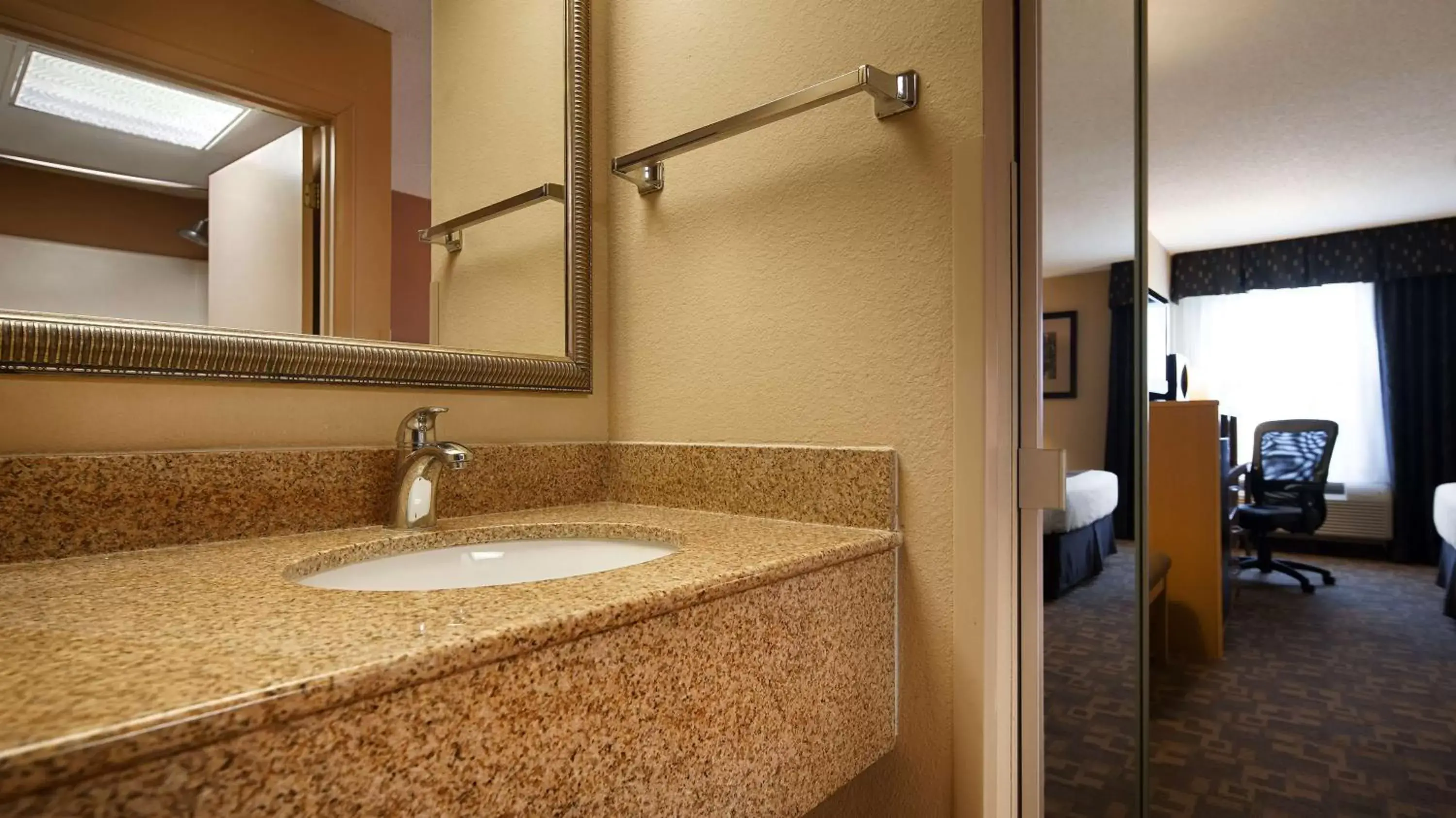 Bathroom in SureStay Plus Hotel by Best Western Roanoke Rapids I-95