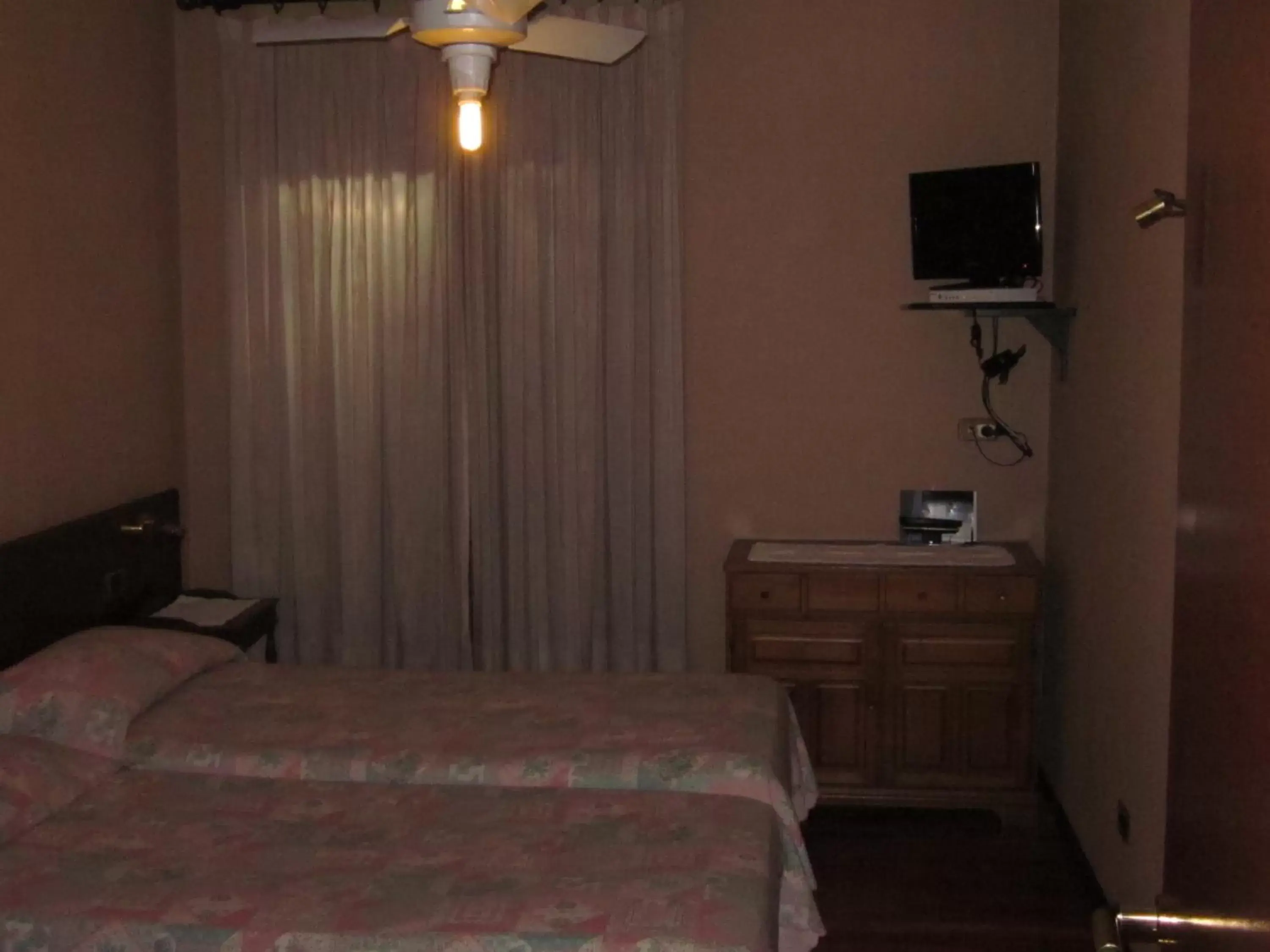 Bedroom, TV/Entertainment Center in Hotel Casale