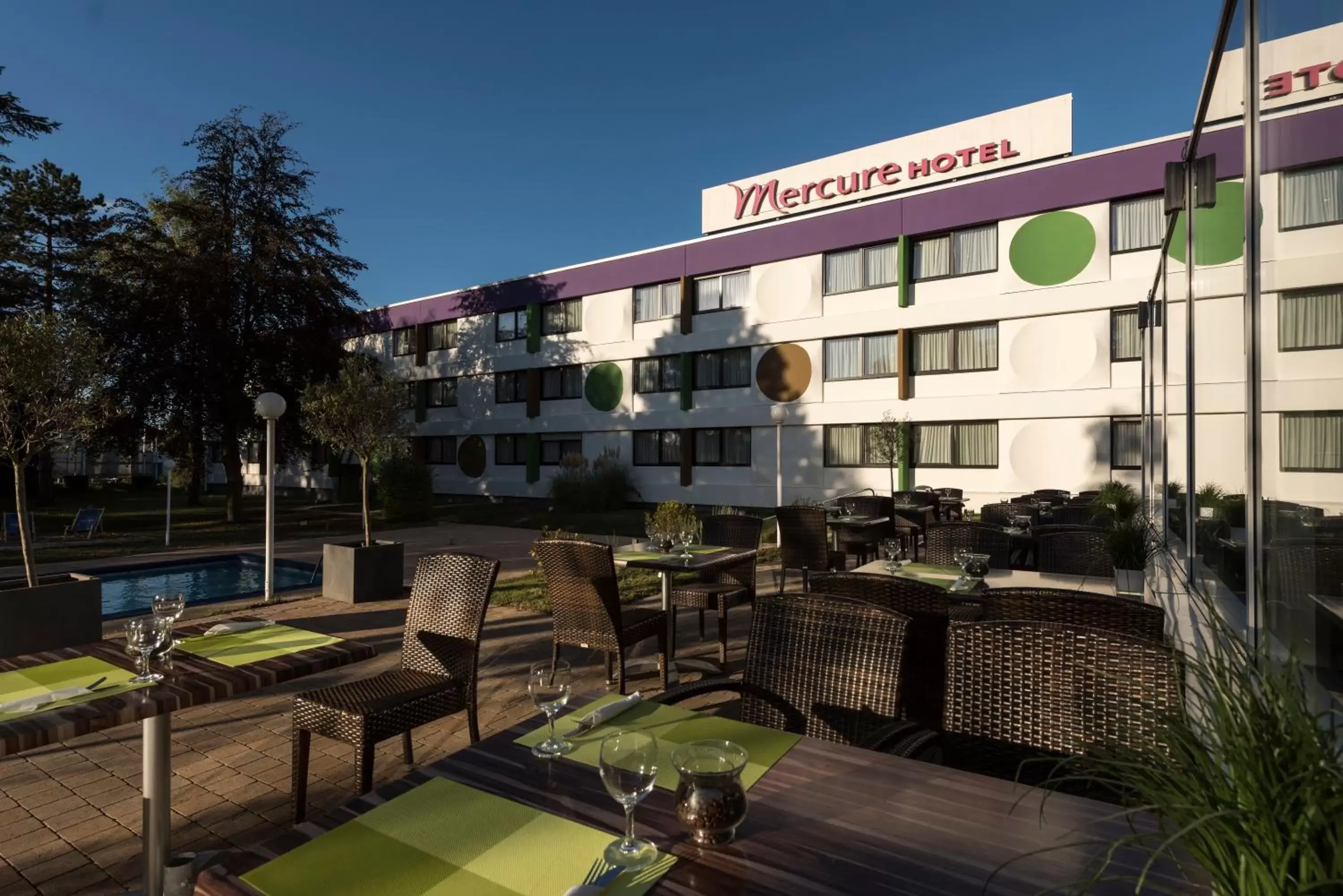 Garden view, Property Building in Mercure Hotel Saarbrücken Süd