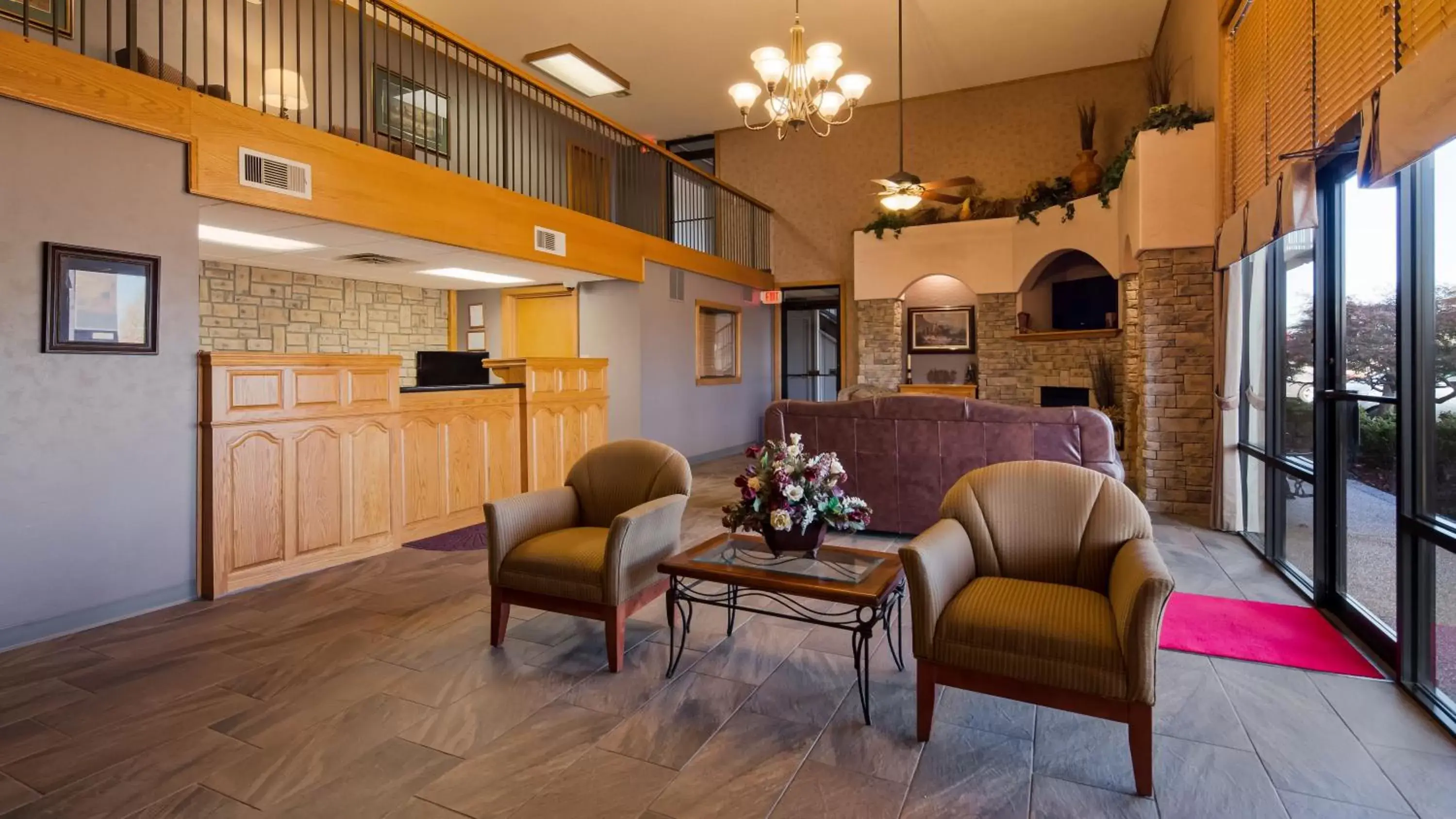 Lobby or reception, Seating Area in SureStay Plus Hotel by Best Western Poteau