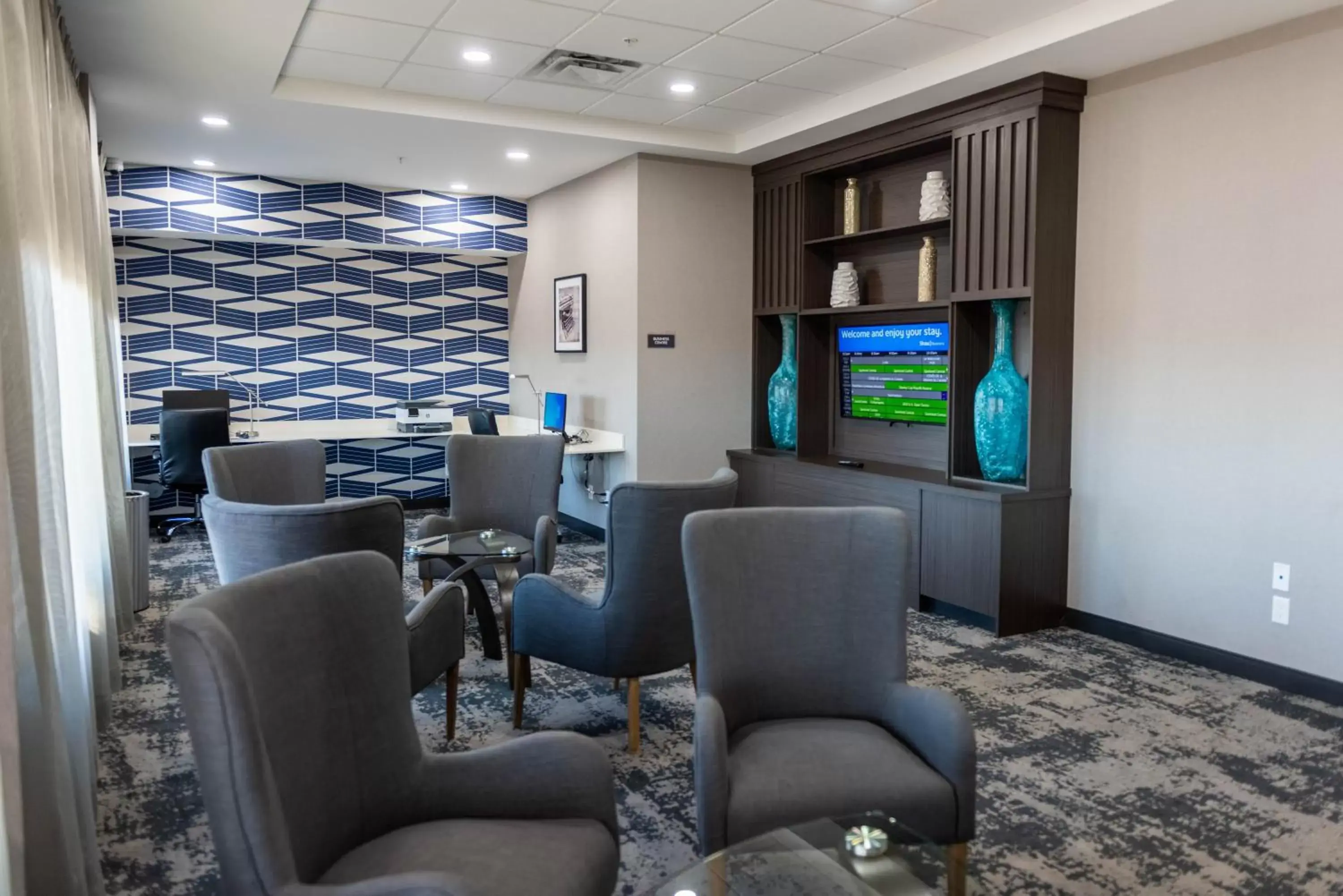 Communal lounge/ TV room, Seating Area in Best Western Premier Executive Residency Medicine Hat