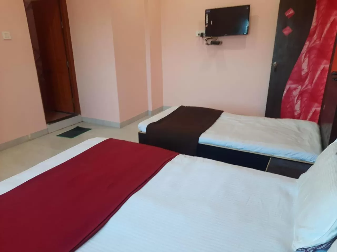 Bed in Hotel Nisarg Lodging And Restaurant