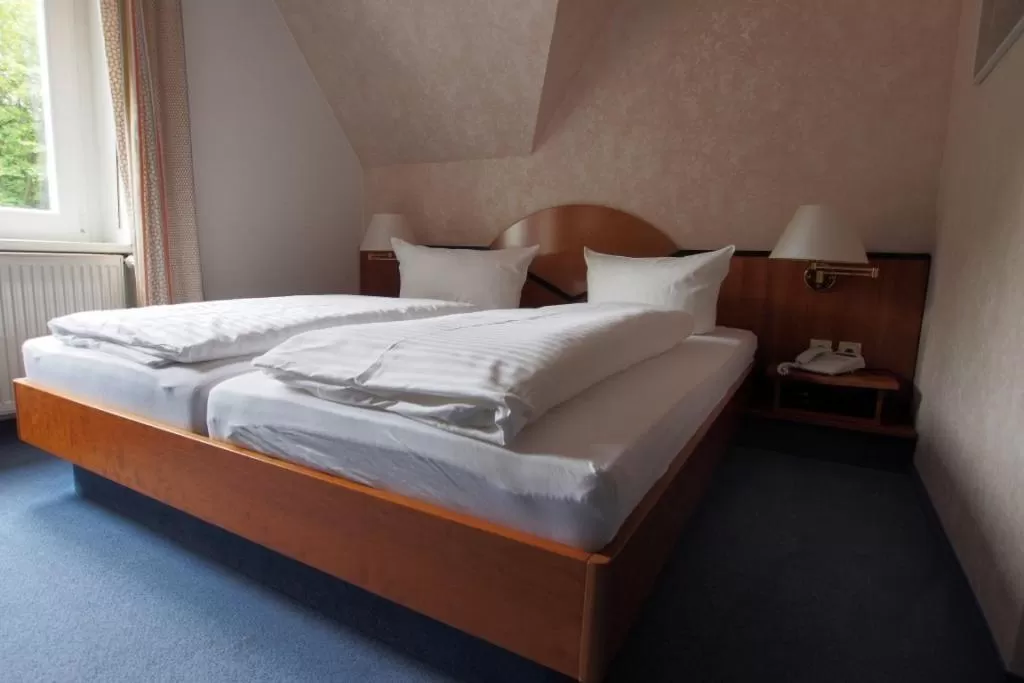 Bed in Hotel Schlossvilla Derenburg