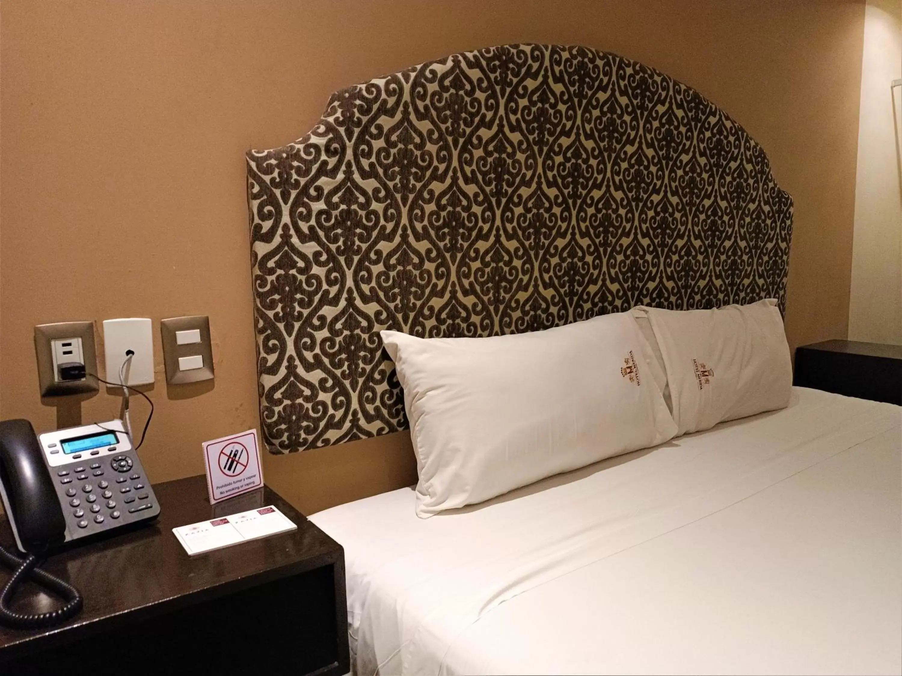 Bed in Hotel Merida