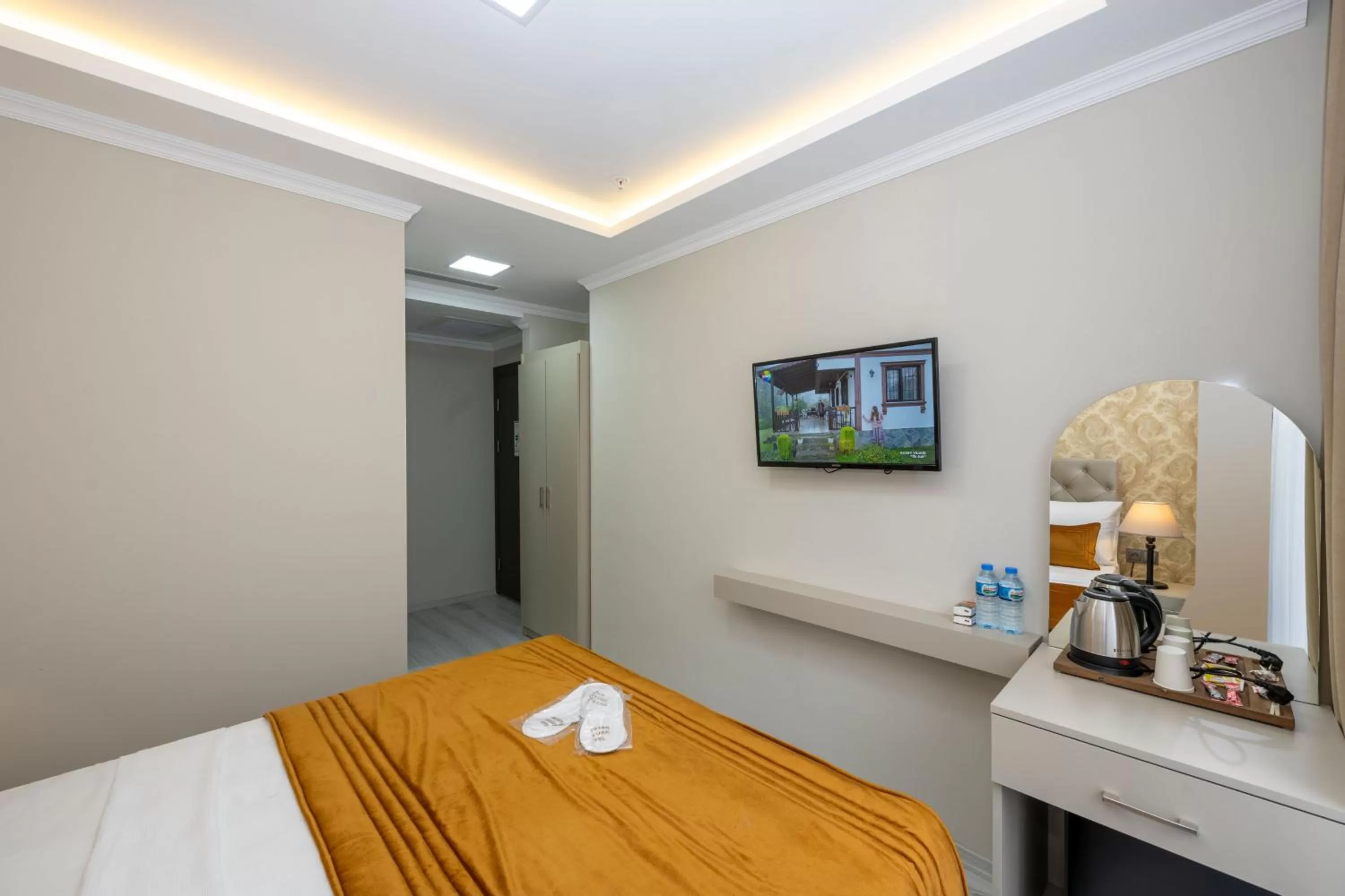 Bed in SKYSTAR DELUXE HOTEL