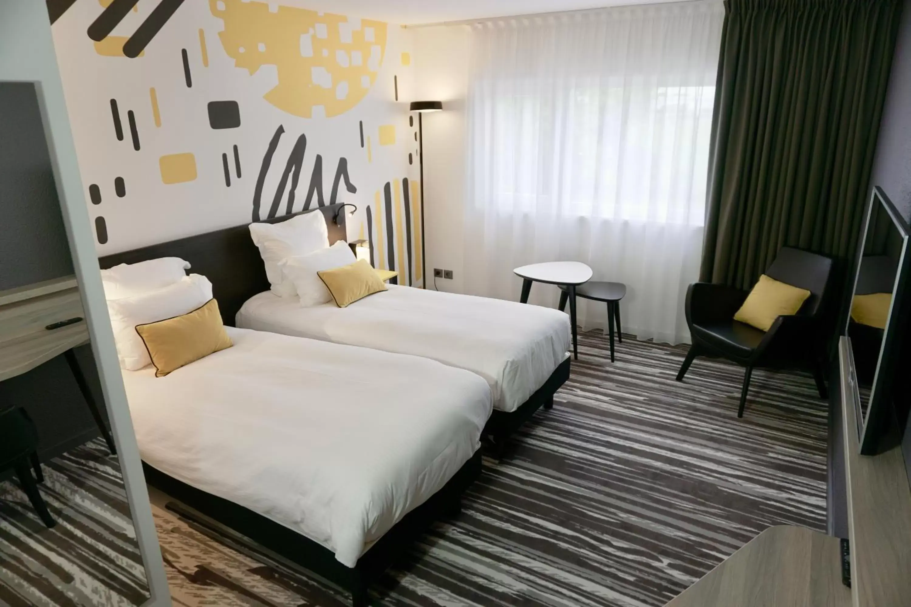 Bed in Golden Tulip Roissy Saint Witz