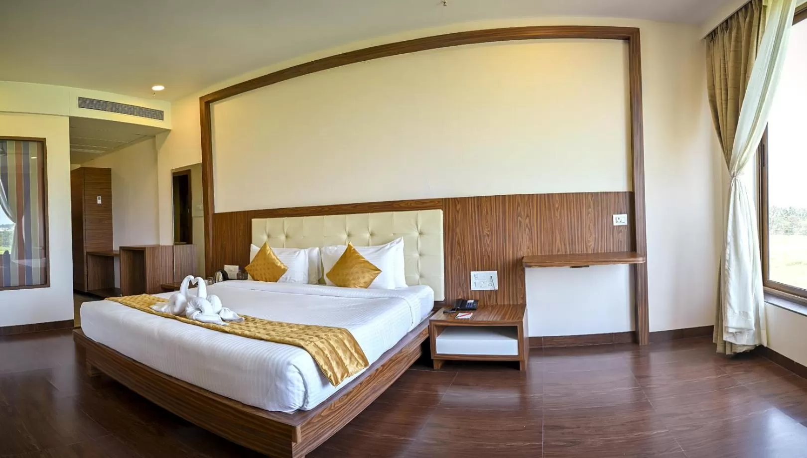 Bed in Hotel Laxmi Empire