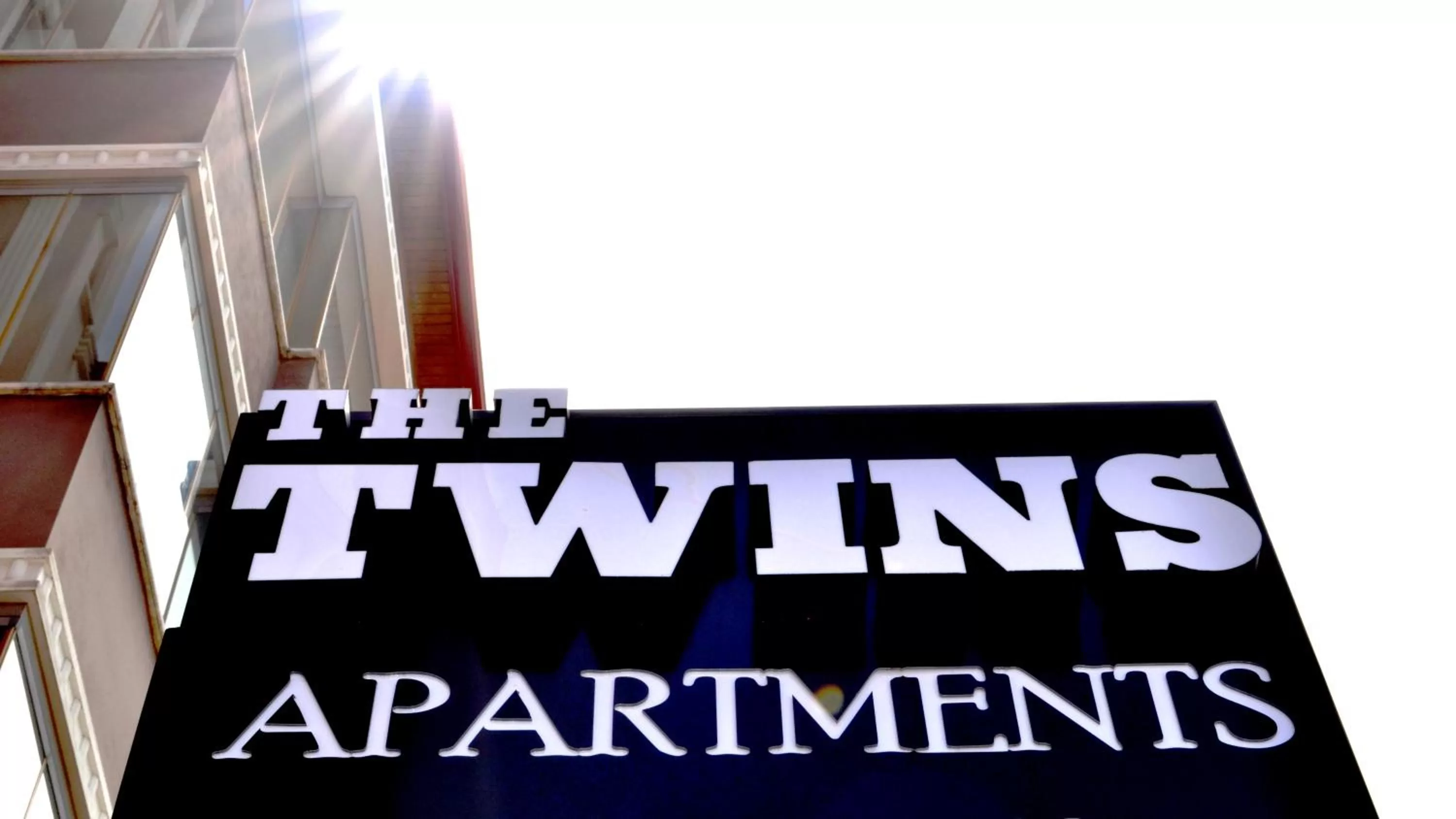 Property logo or sign in The Twins Apartmens