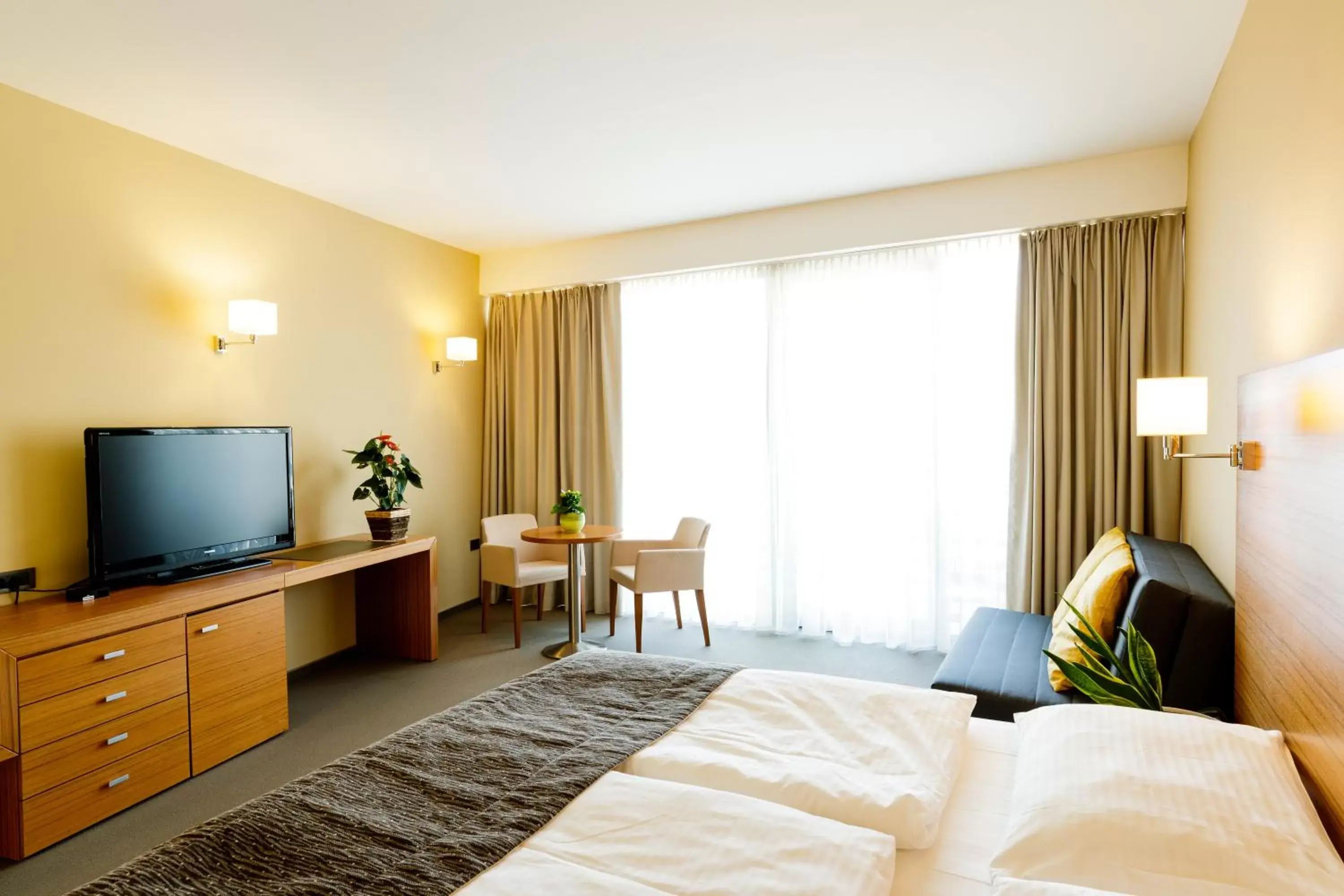 Bedroom, TV/Entertainment Center in Bohinj Eco Hotel