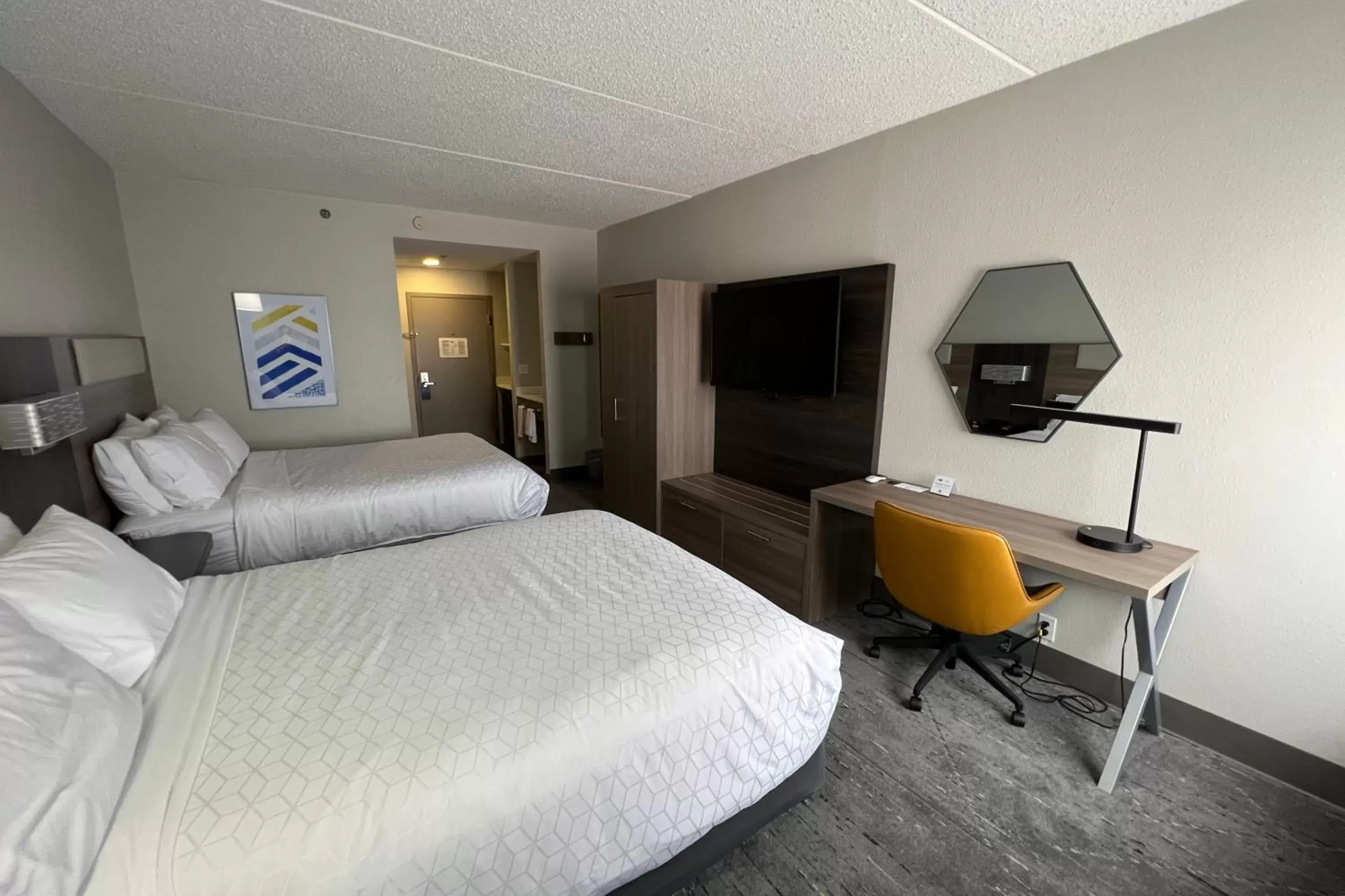 Bedroom, TV/Entertainment Center in Holiday Inn Express Harrisburg NE, an IHG Hotel