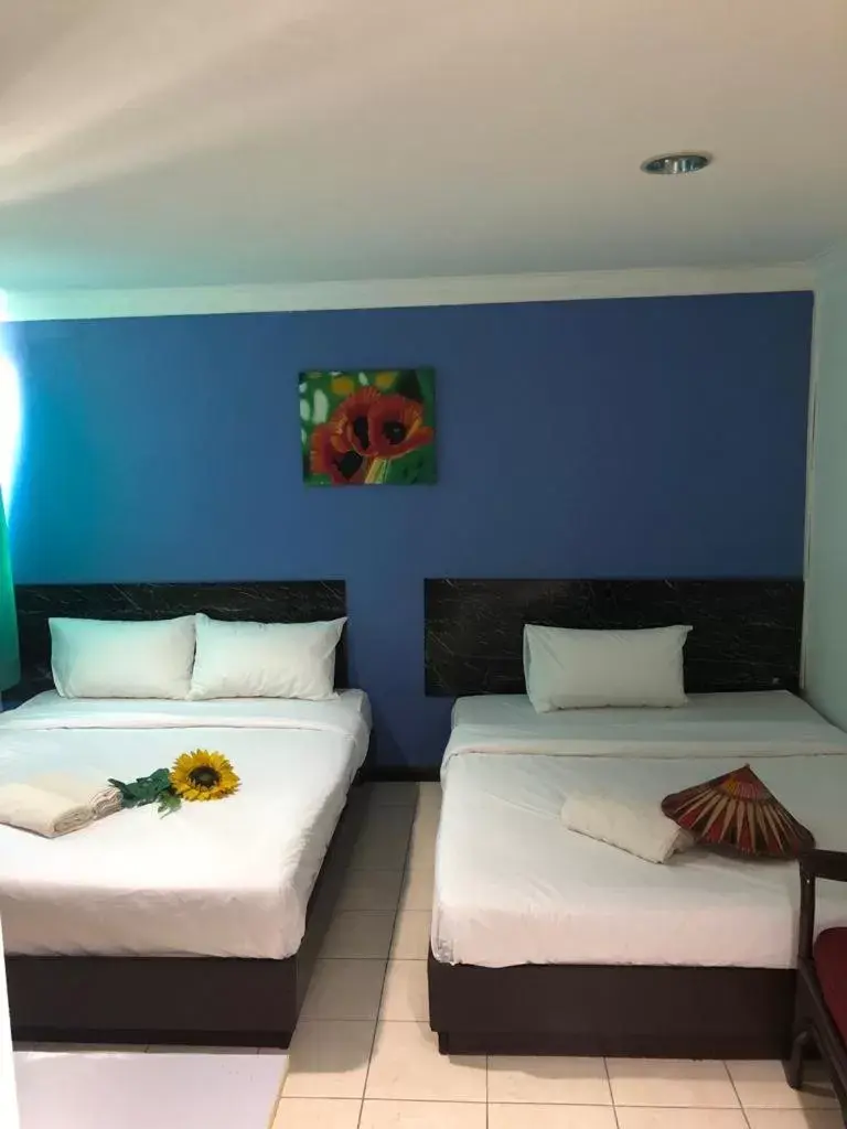 Bed in Kapit Hotel