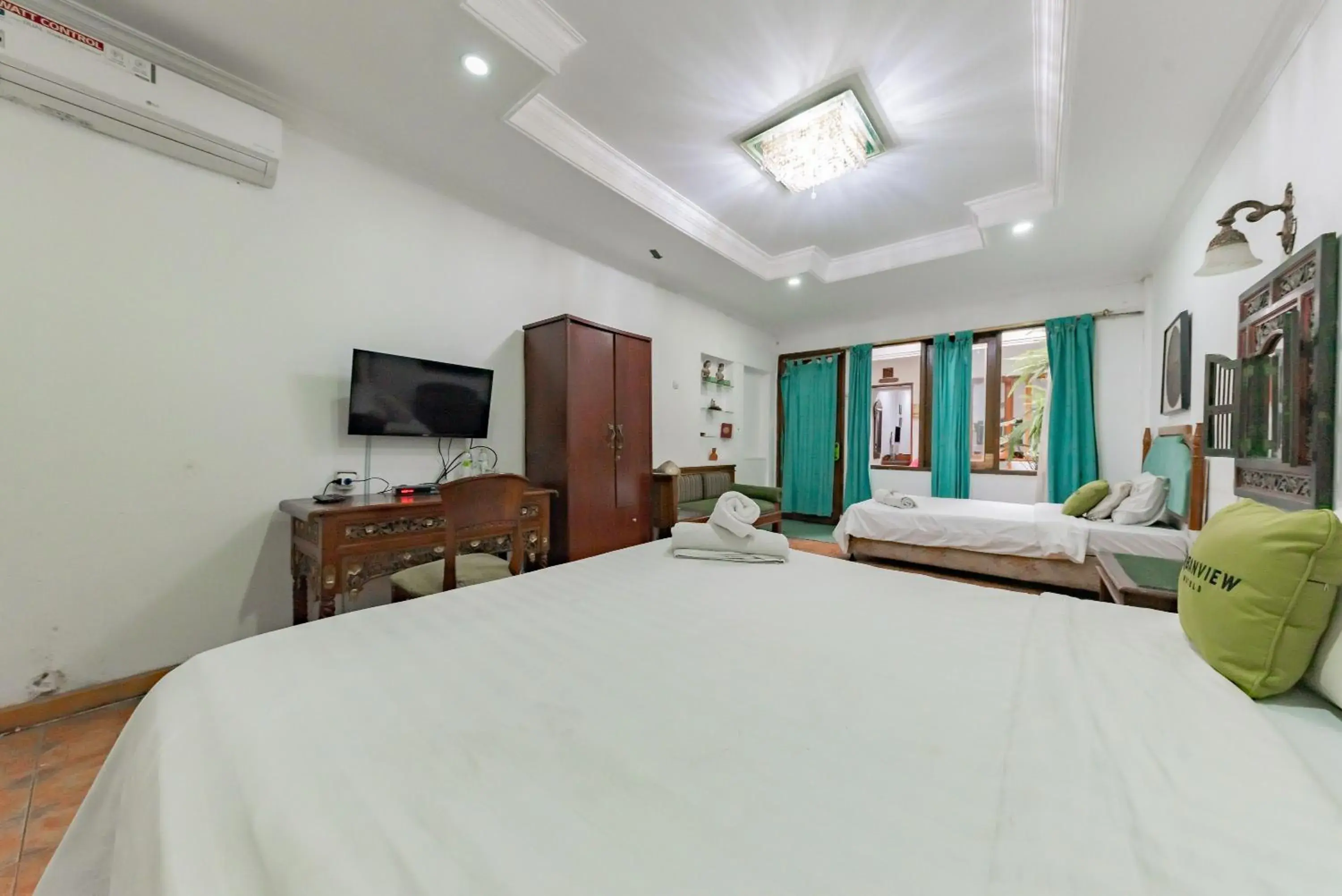 Bedroom, Bed in Urbanview De Ethnic Hotel Bandung