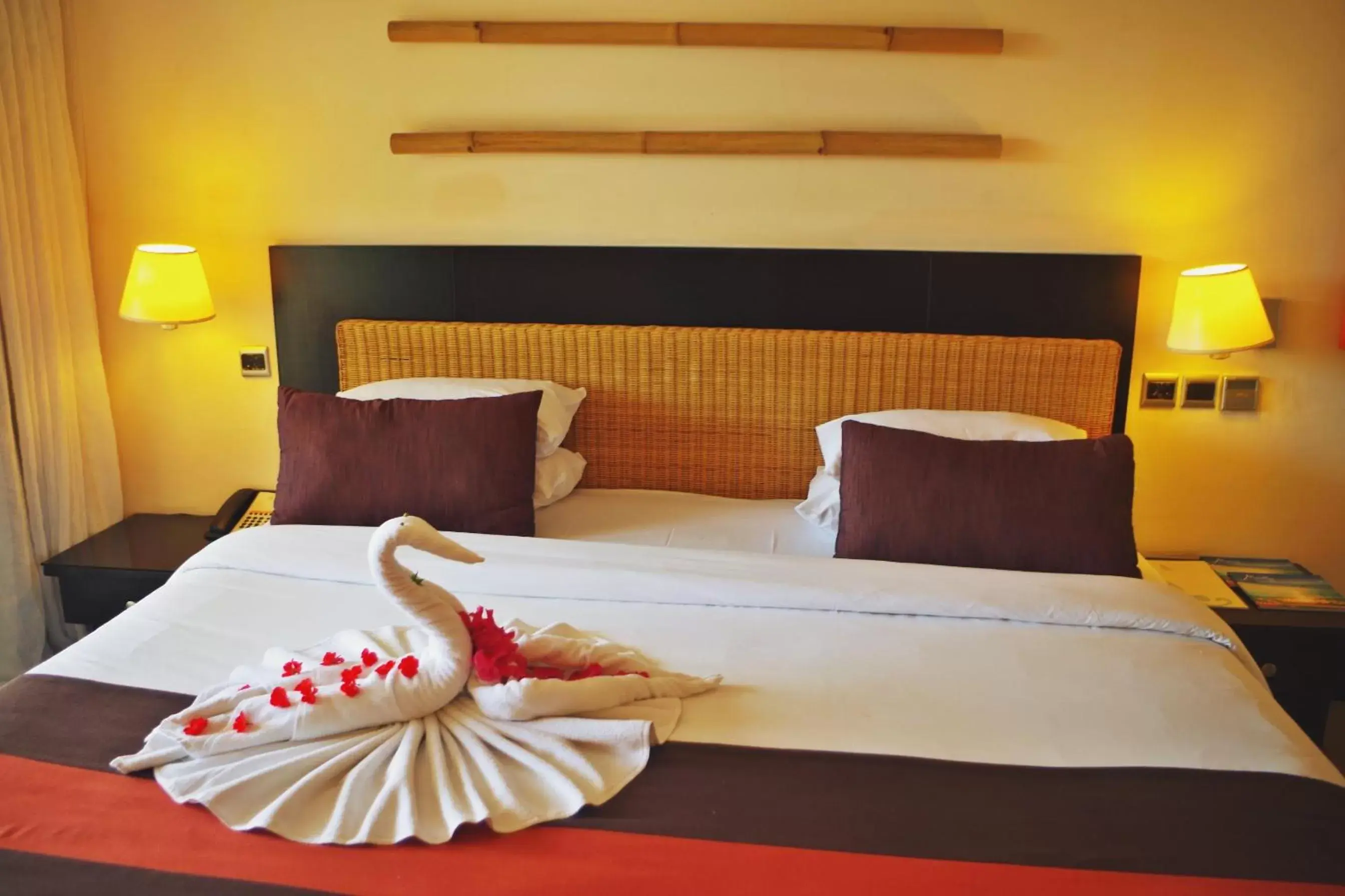 Bed in Pearle Beach Resort & Spa