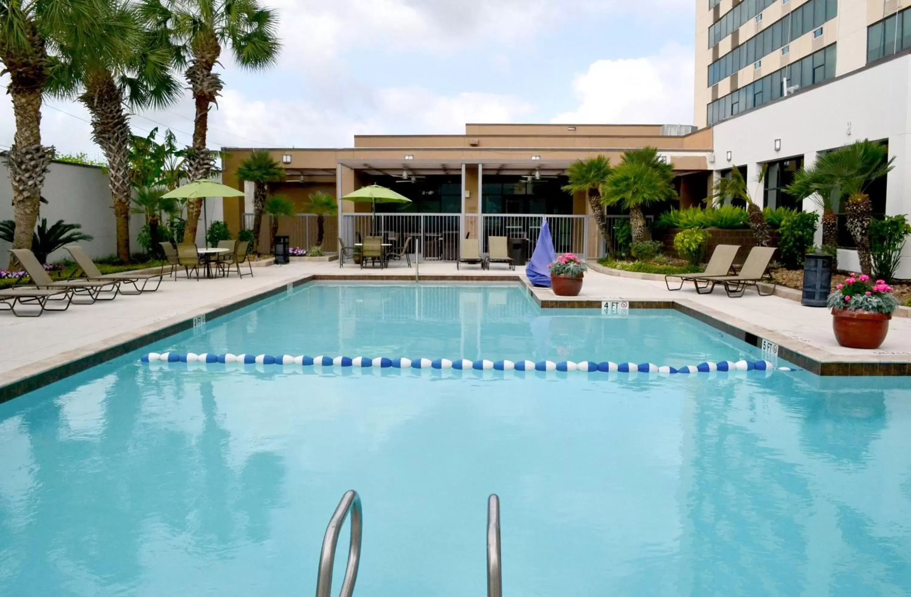 Swimming Pool in Holiday Inn Houston S - NRG Area - Med Ctr, an IHG Hotel