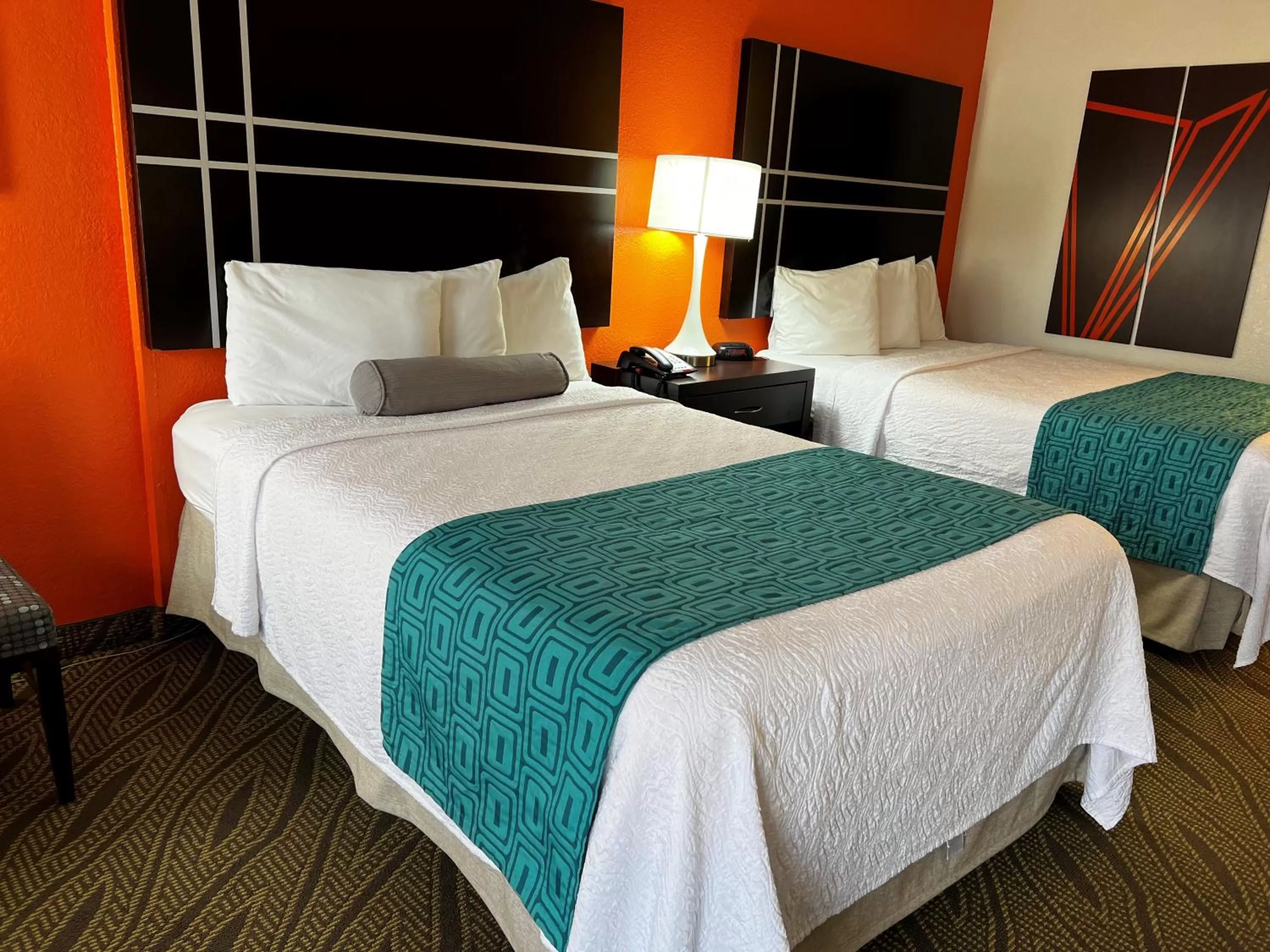 Bed in Howard Johnson by Wyndham Houston Heights Downtown